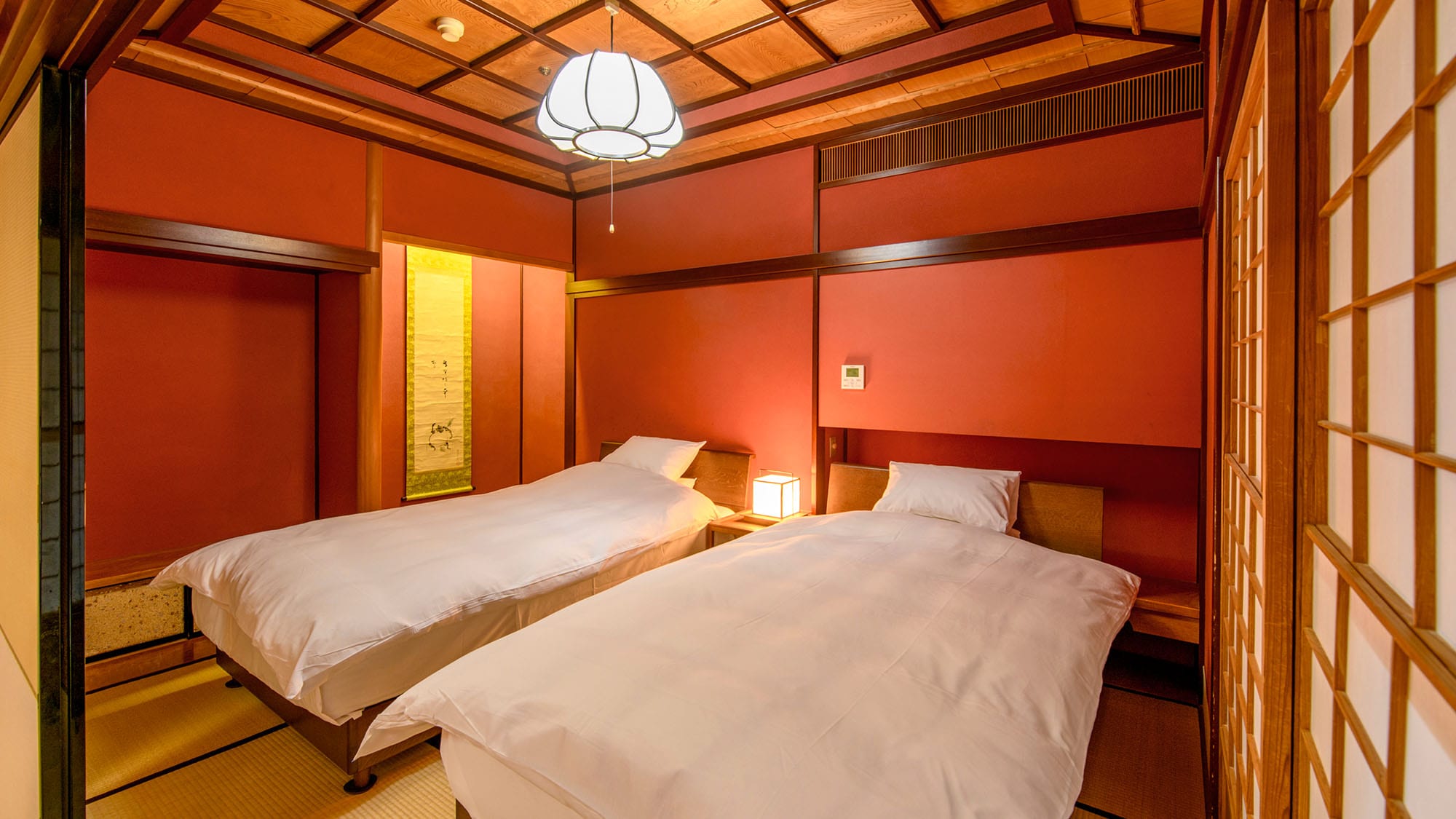 [Akizono Room: Junior Suite] A unique room with vibrant red vermilion walls.