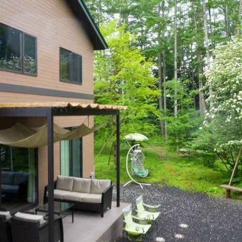Terrace with pergola leading from the living room