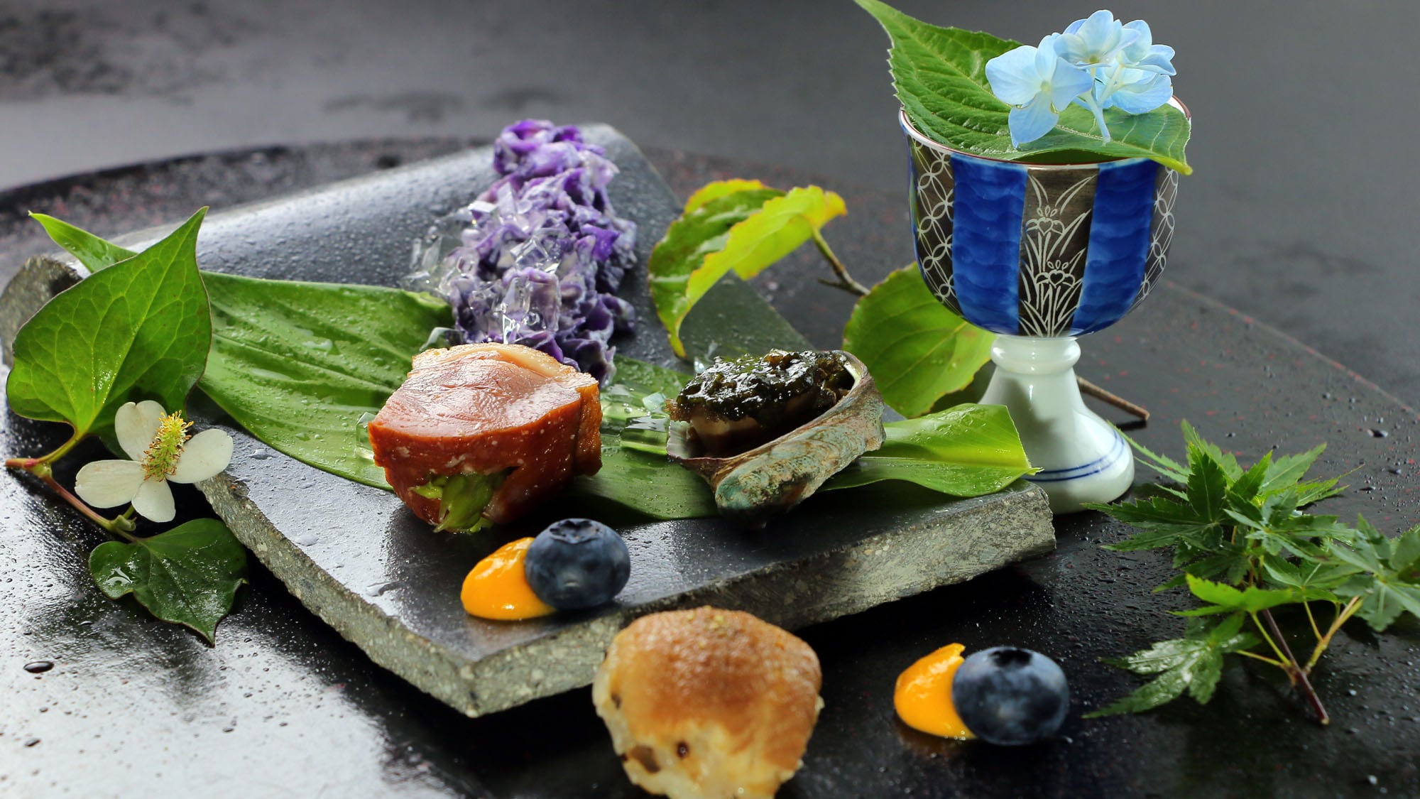 An example of a summer banquet: Appetizers: Conger eel temari, mugwort miso on tokonoshi, purple cabbage with white dressing, Japanese yam, duck asparagus