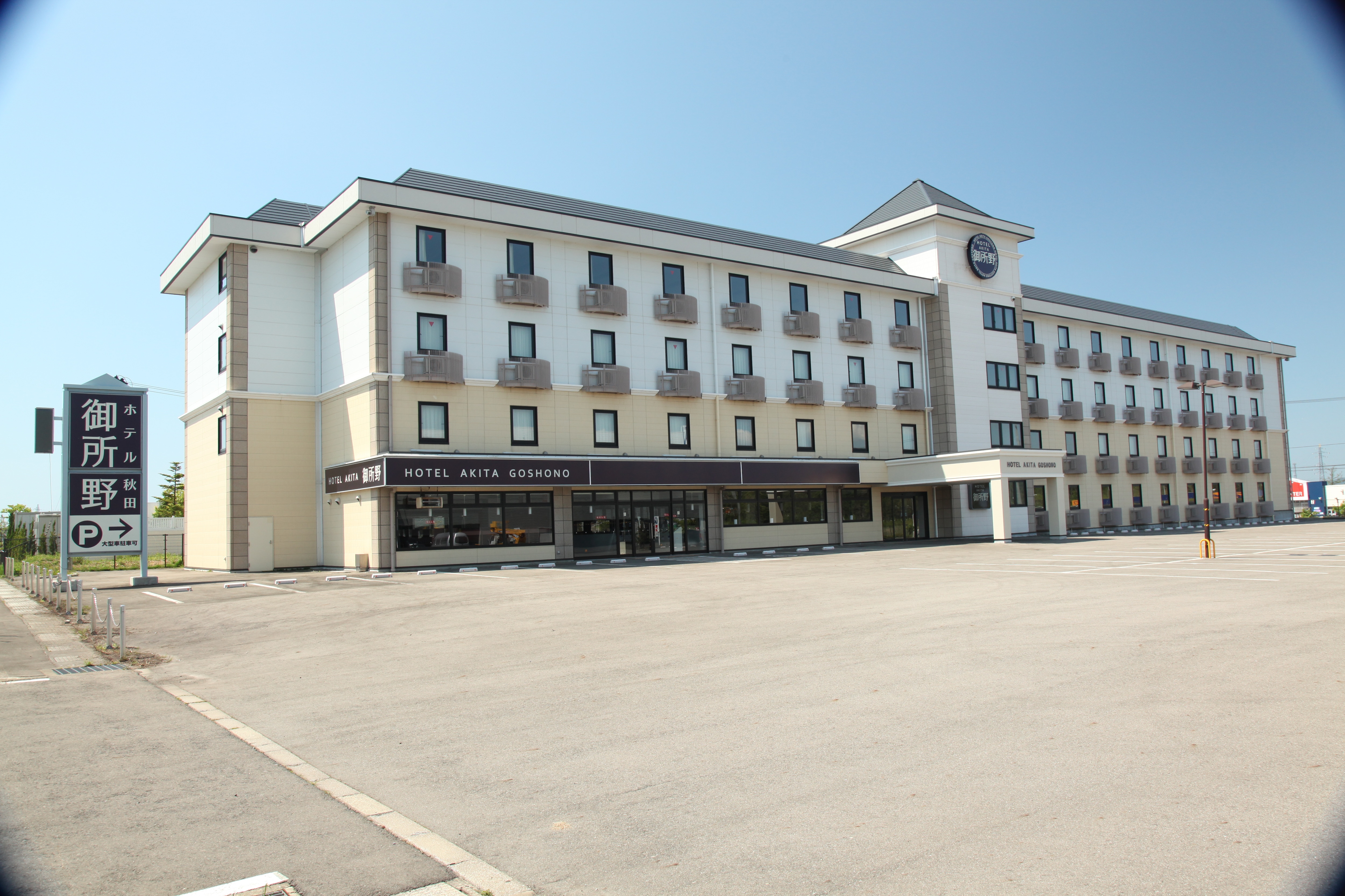 Exterior and large free parking lot