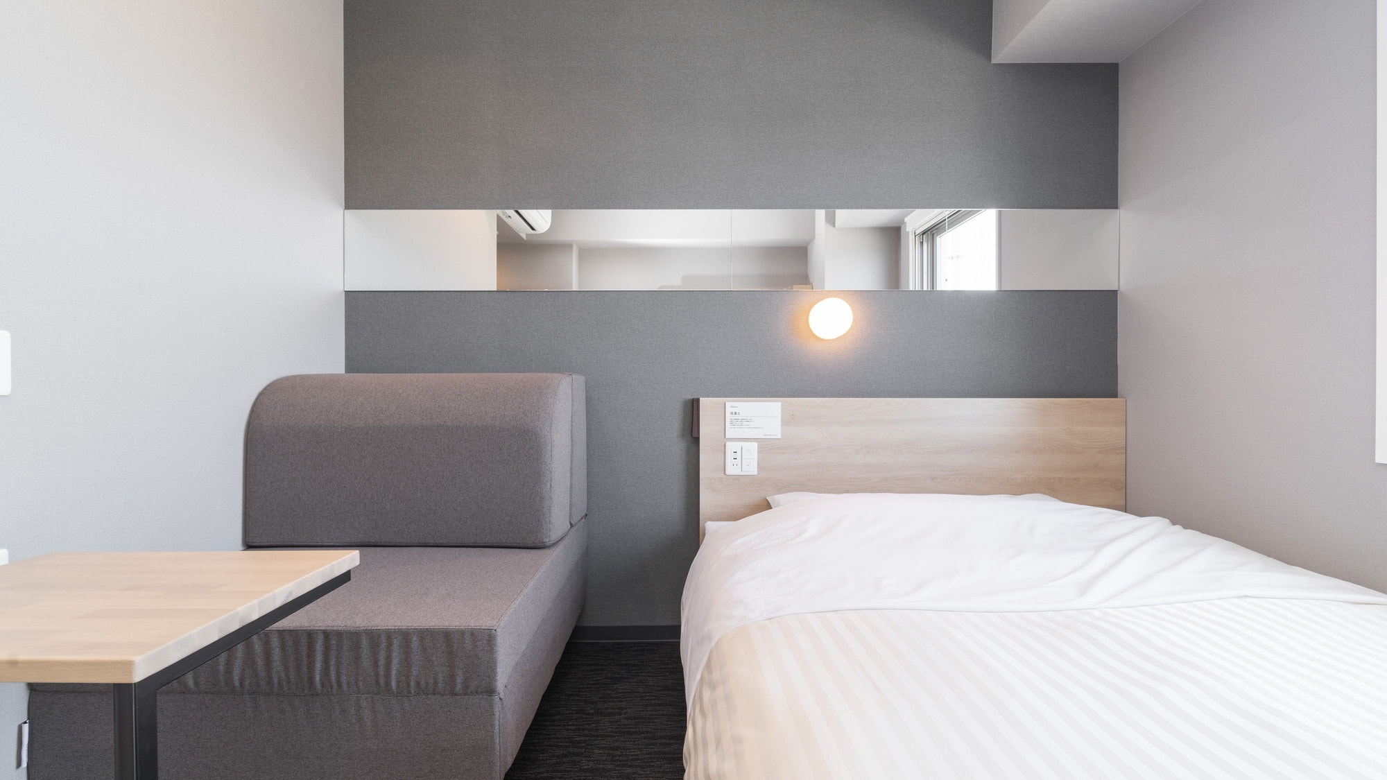 Room with double bed and sofa bed