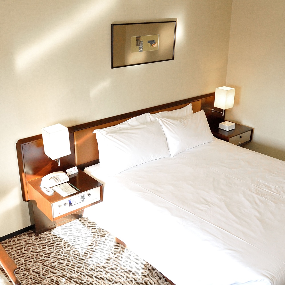 Superior double (lantai 9 hingga 12) Ukuran: 26 meter persegi Lebar tempat tidur: 200cm×160cm
