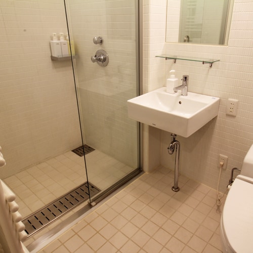 *Example of a 3-bedroom deluxe or premium room/Refresh yourself after a long day in the shower booth!