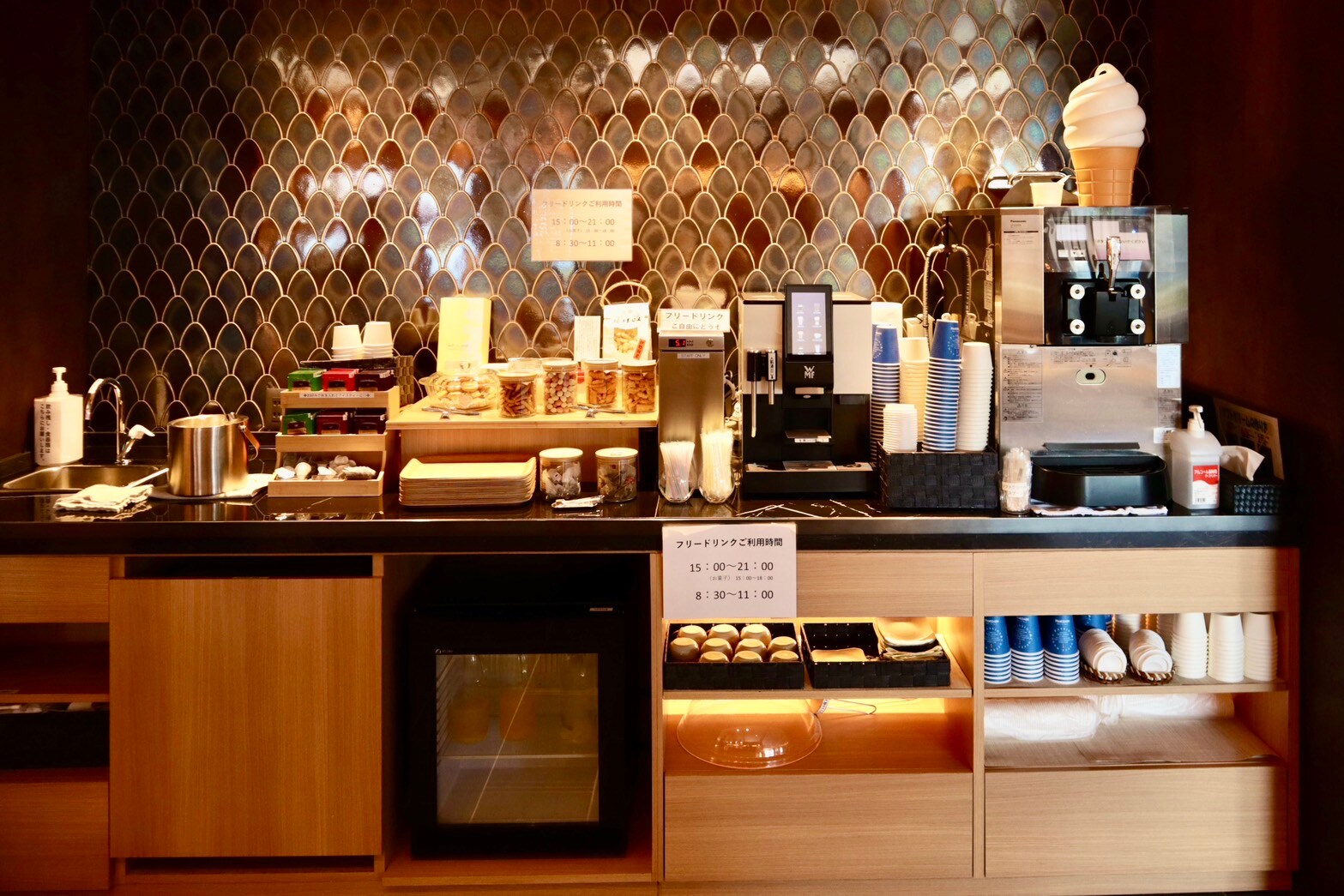 Free drink corner next to the shop