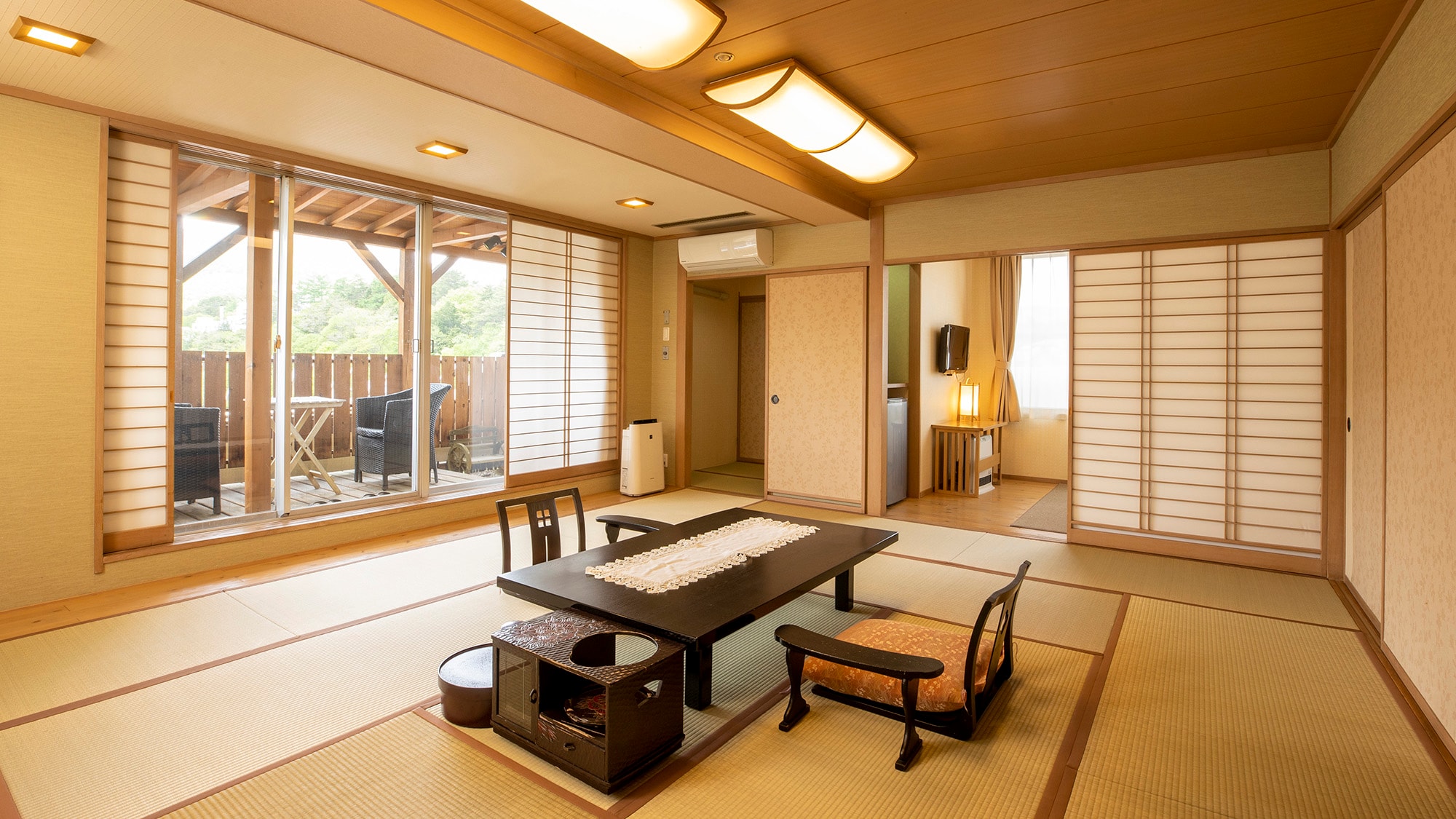 Japanese-style room with wooden deck and massage machine (premium)
