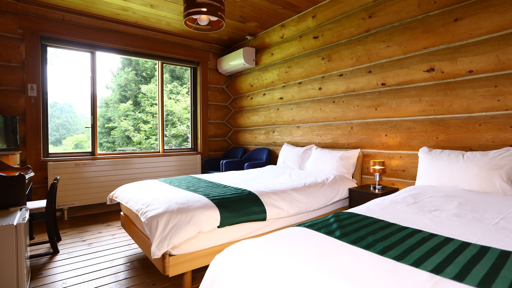 A twin room with a beautiful view from the window