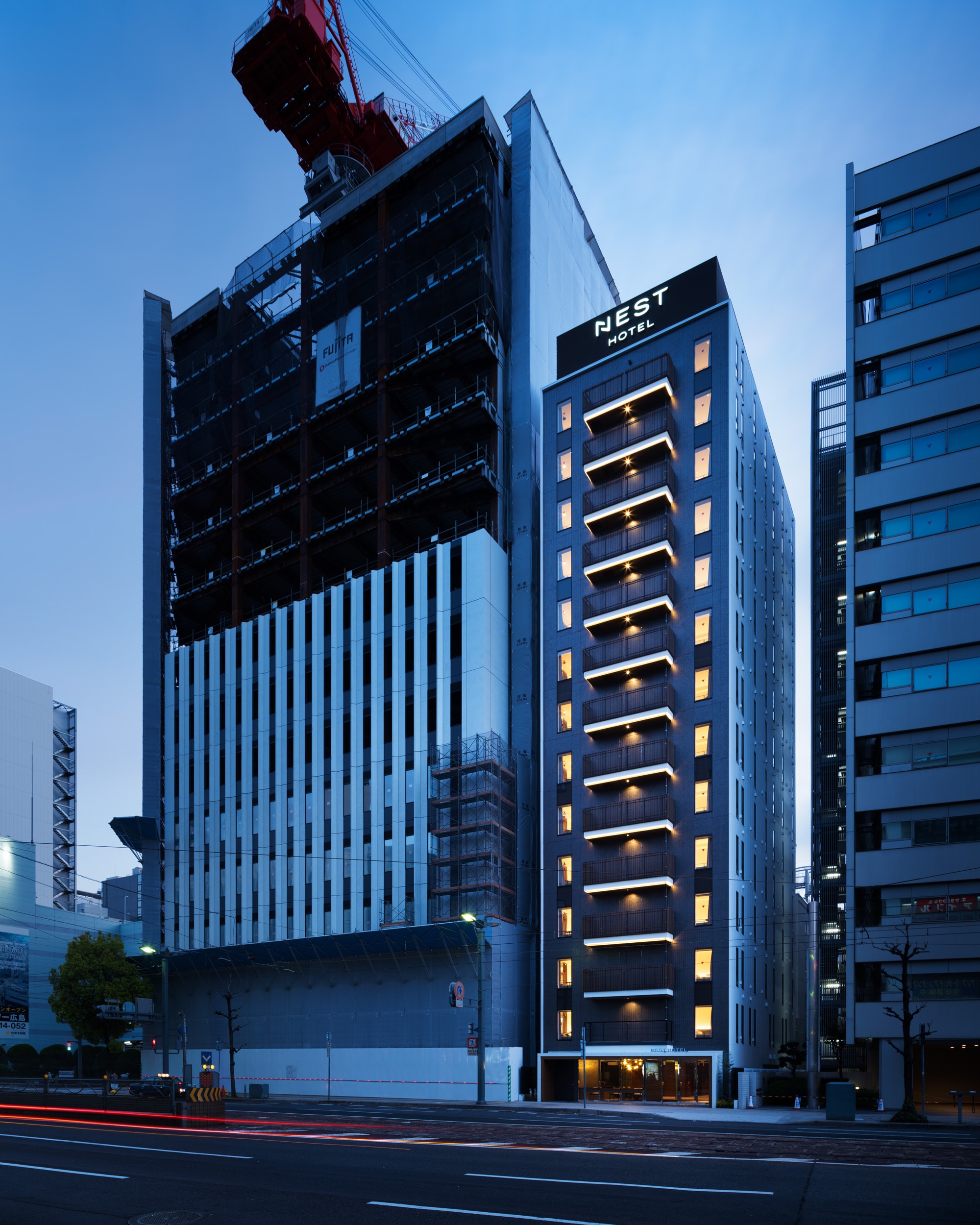 There is a NESTHOTEL sign on the top floor so you can spot it from far away.