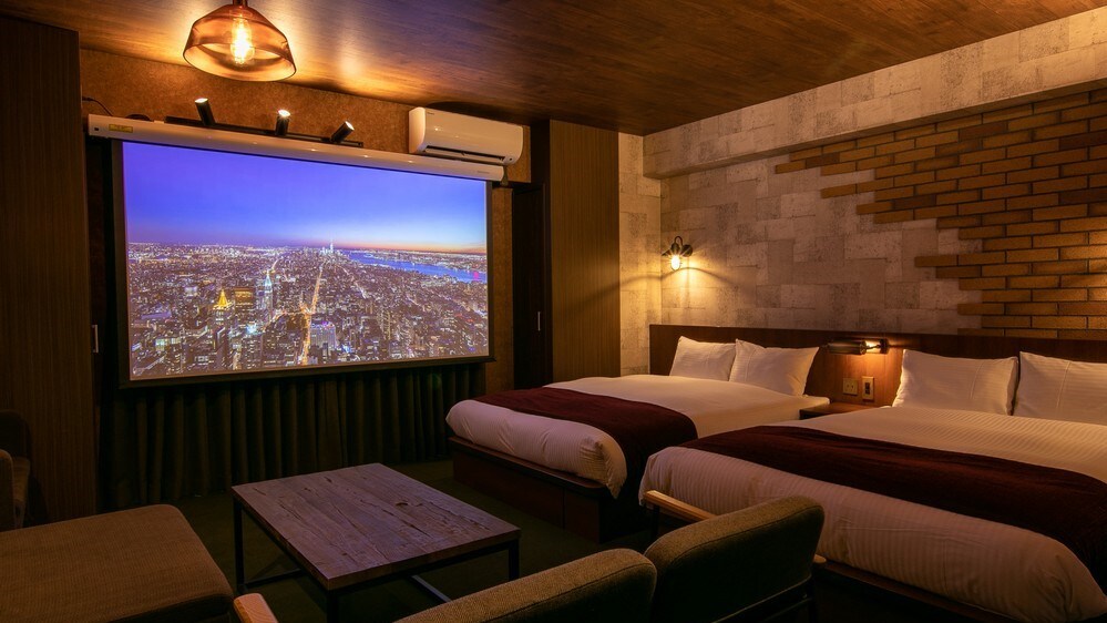 This room comes with two double beds and one sofa bed, as well as a large, impressive screen ☆ Enjoy your time here!