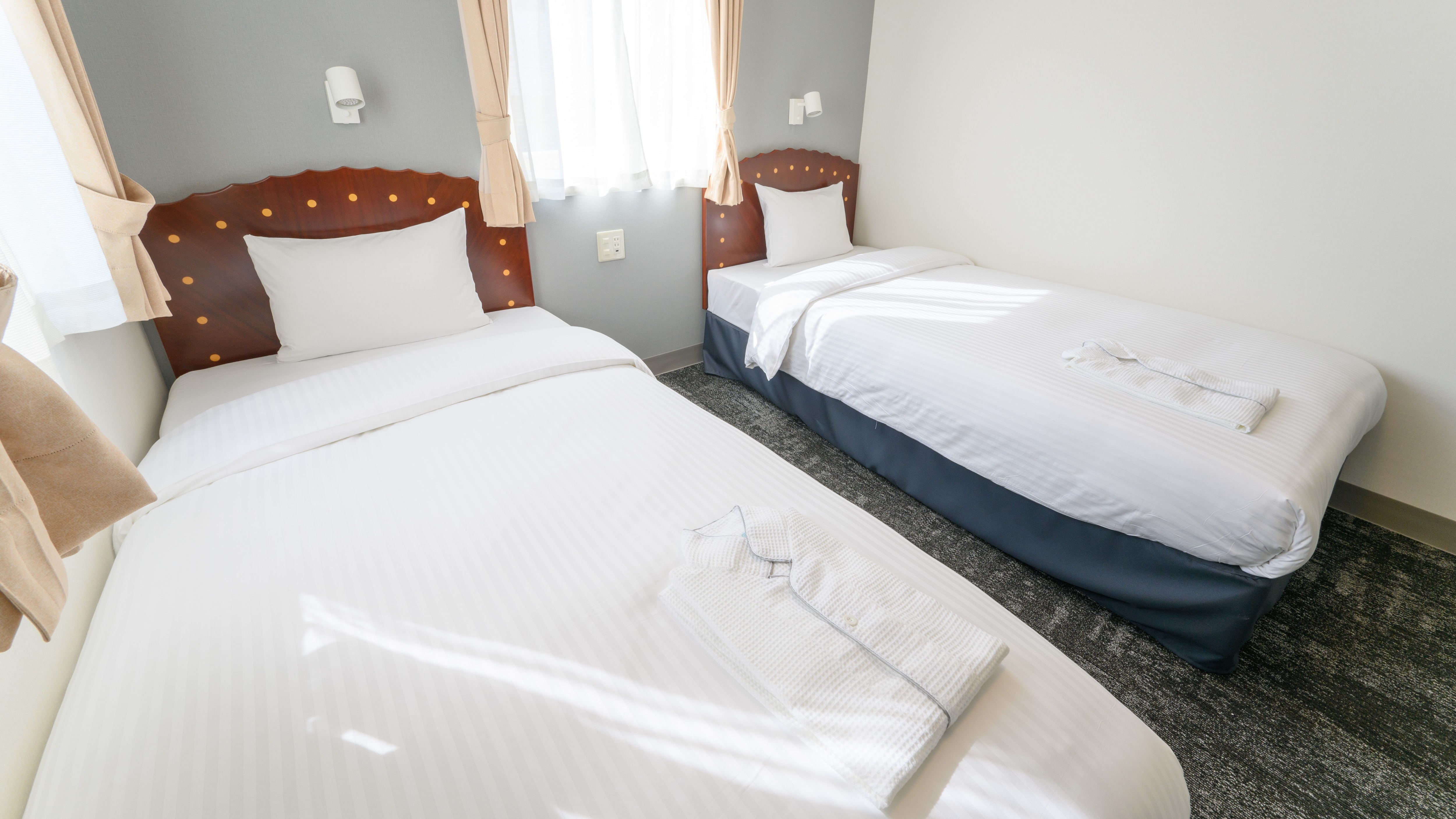 Twin room/Can be used for various occasions such as with family or friends. (Example of a guest room)