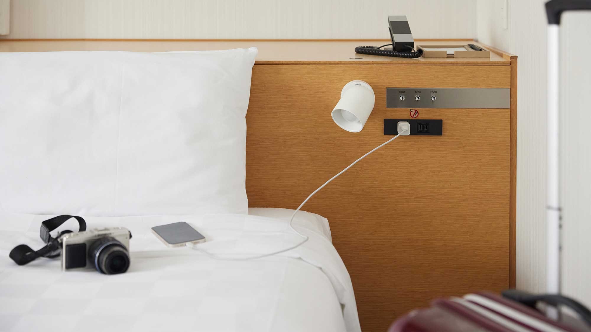 The headboard of the bed has an outlet and a USB port for convenient charging.
