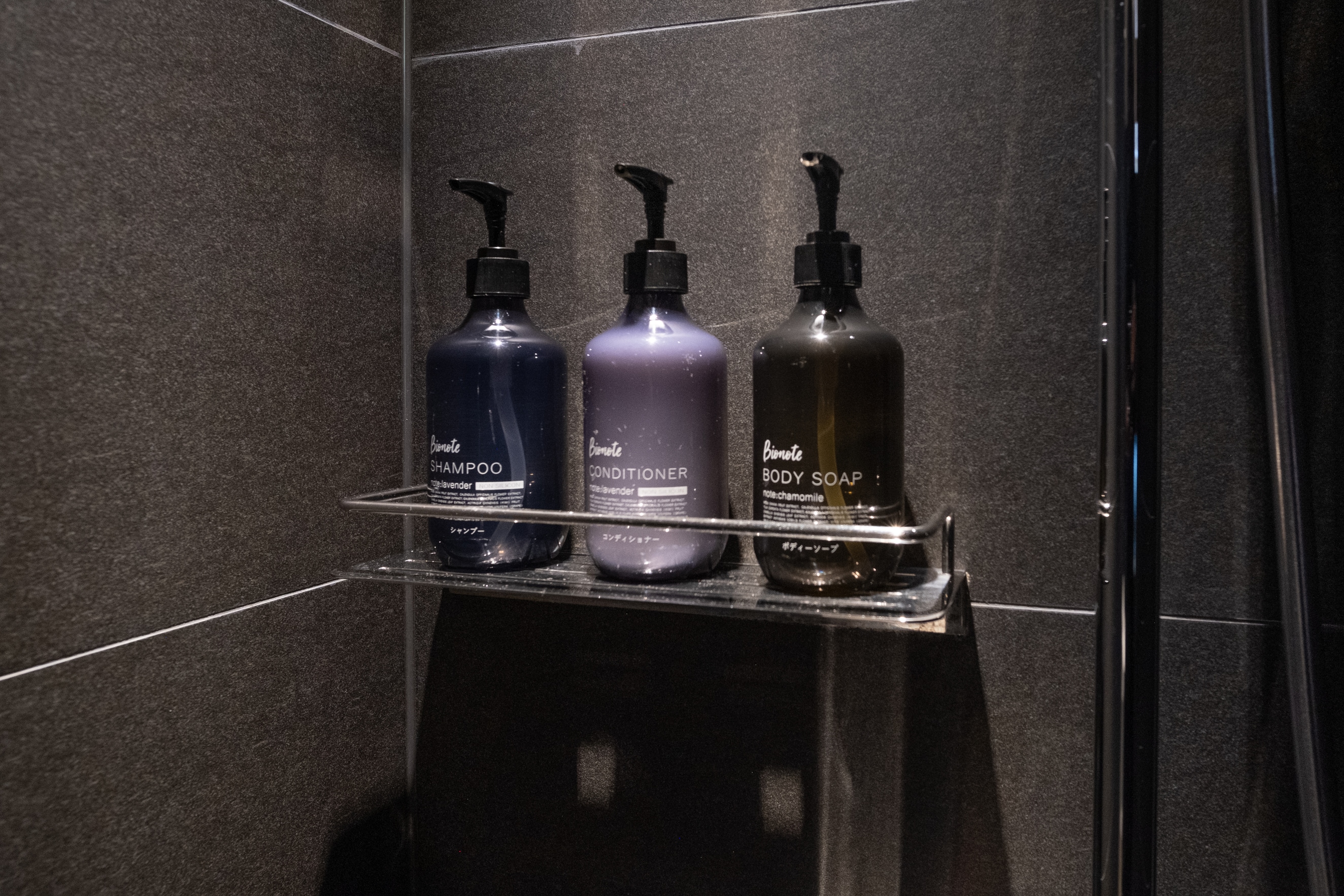 Shampoo, conditioner and body soap provided in all rooms