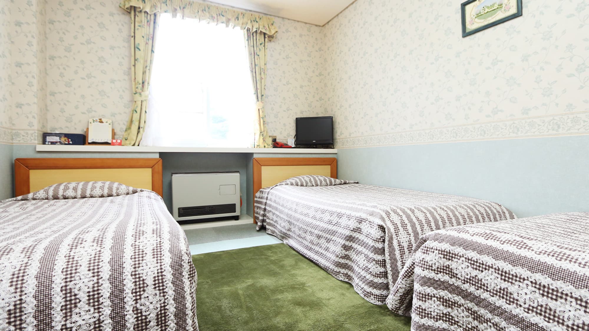 A spacious and comfortable triple room.