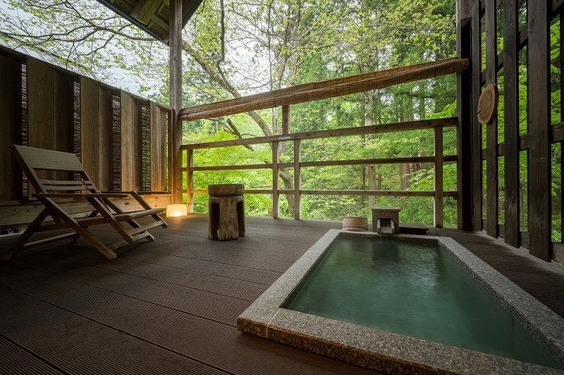 A detached "water pool" with an open-air bath