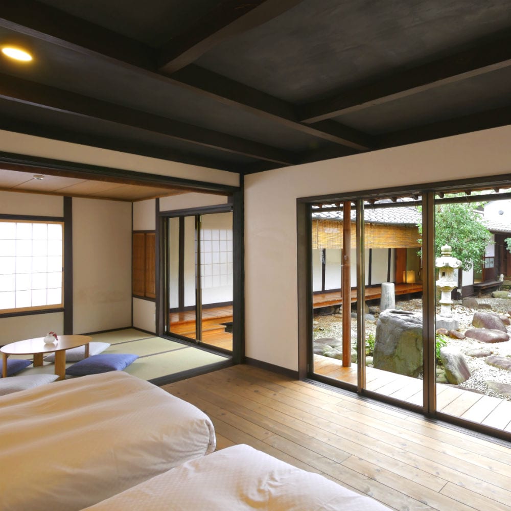 This room features a large window overlooking the courtyard.