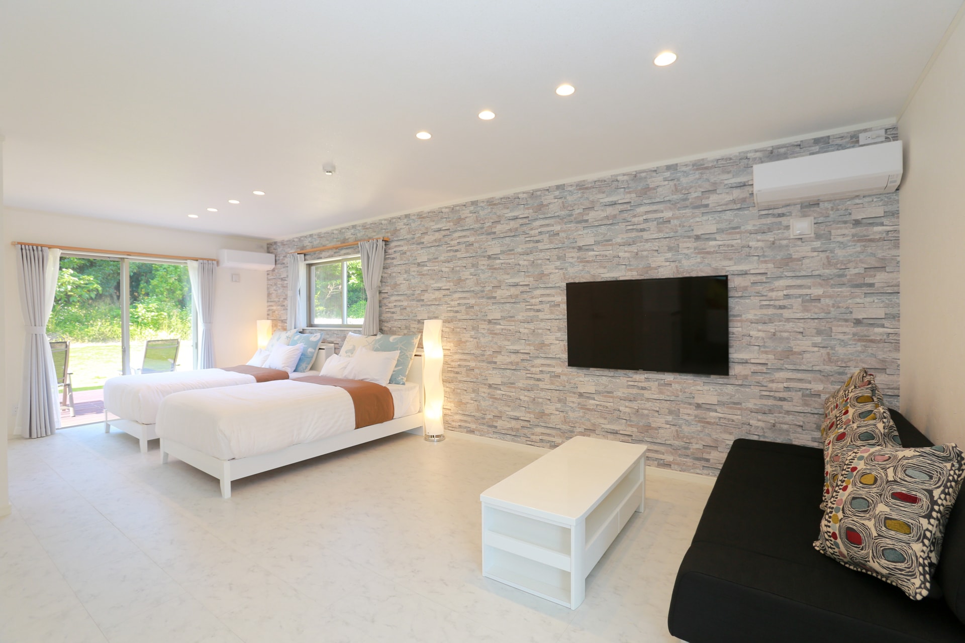 The room is called Cassiopeia and is a modern and sophisticated space with a stone motif.
