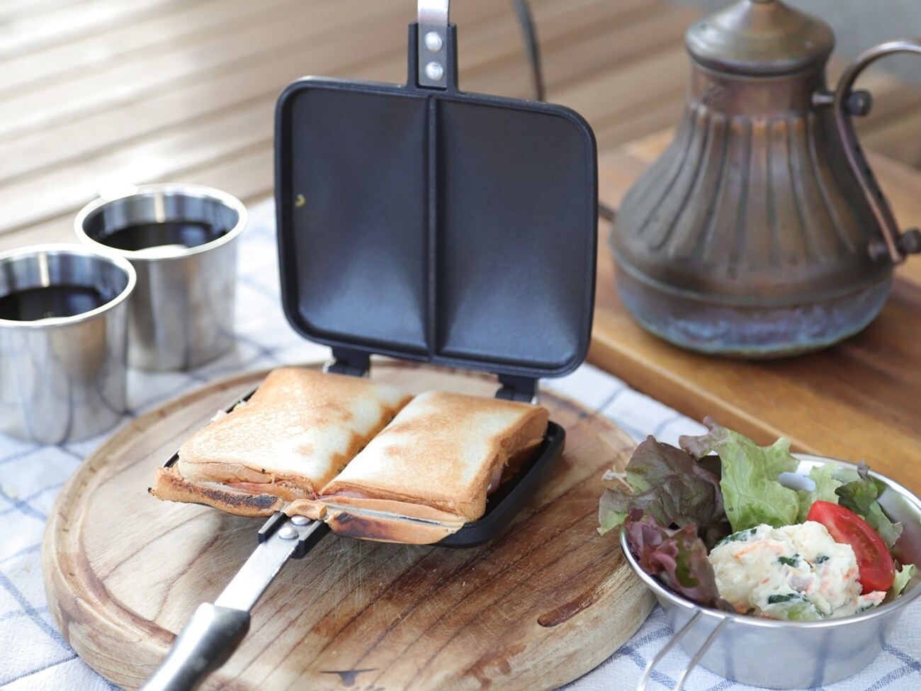 It is located on a slight hill, so you can get a good view of the grounds. There is a pergola at the back, so you can enjoy BBQ without worrying about being seen!