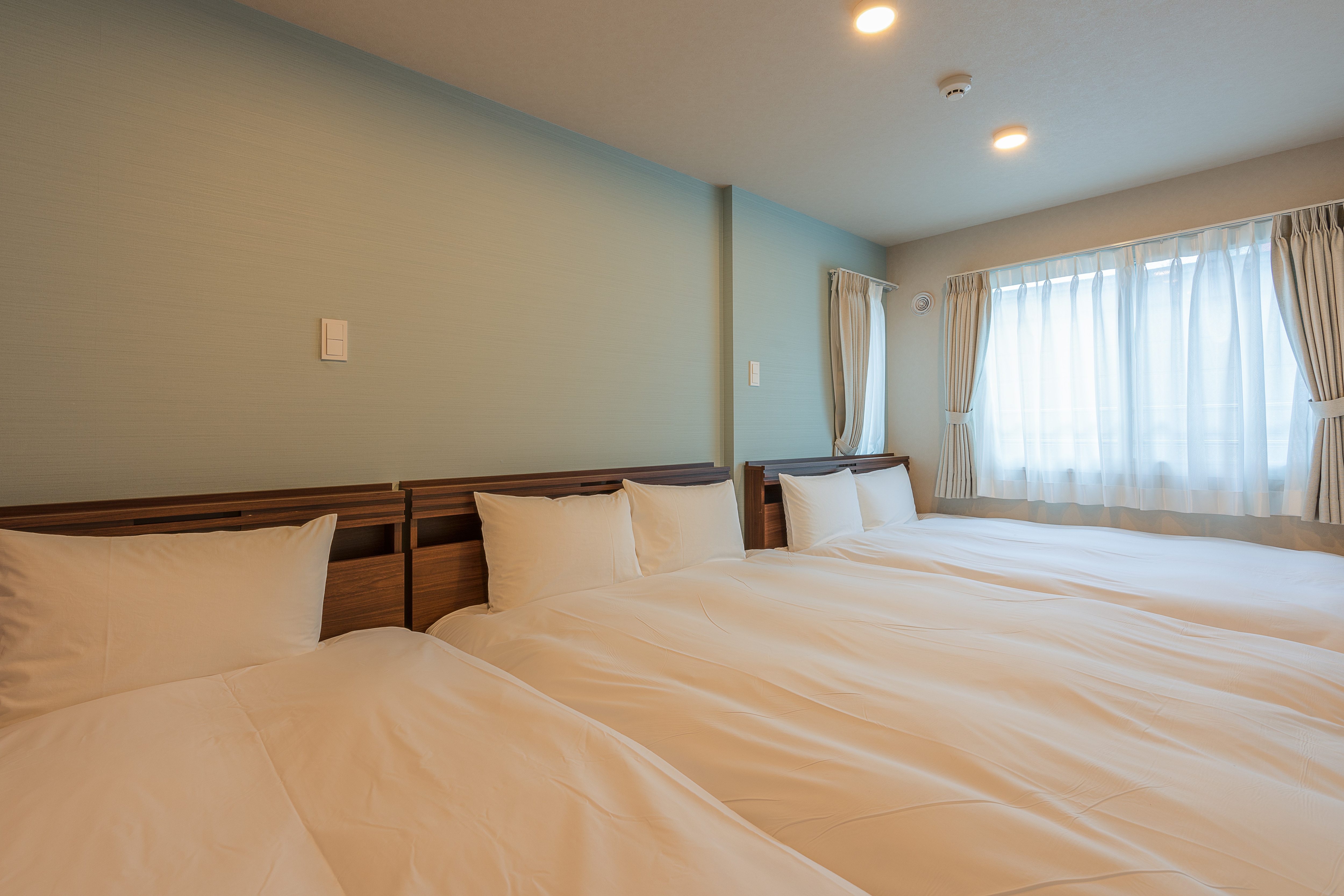 ห้องมาตรฐานสามเตียง: ห้องนอน