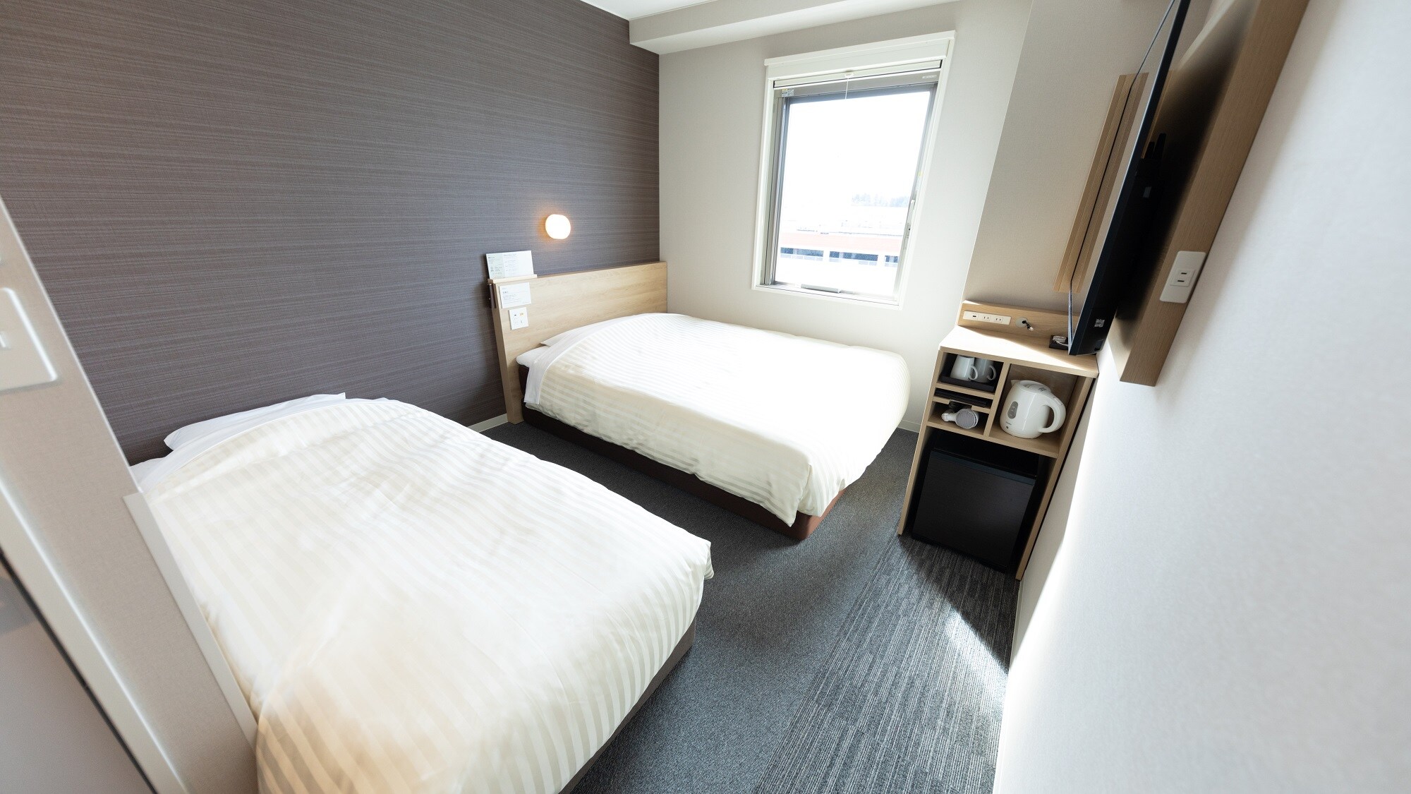 This is a twin room with an extra bed.