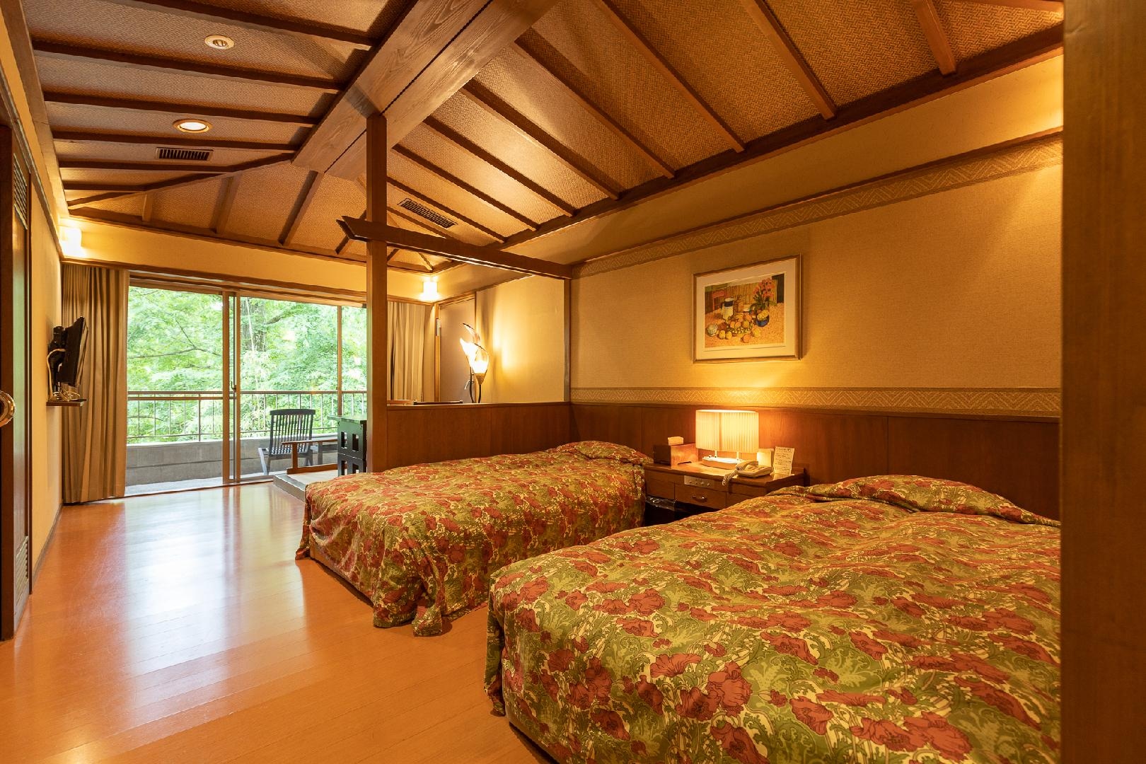 Guest room with open-air bath ～Semi-barrier-free, Balinese style～