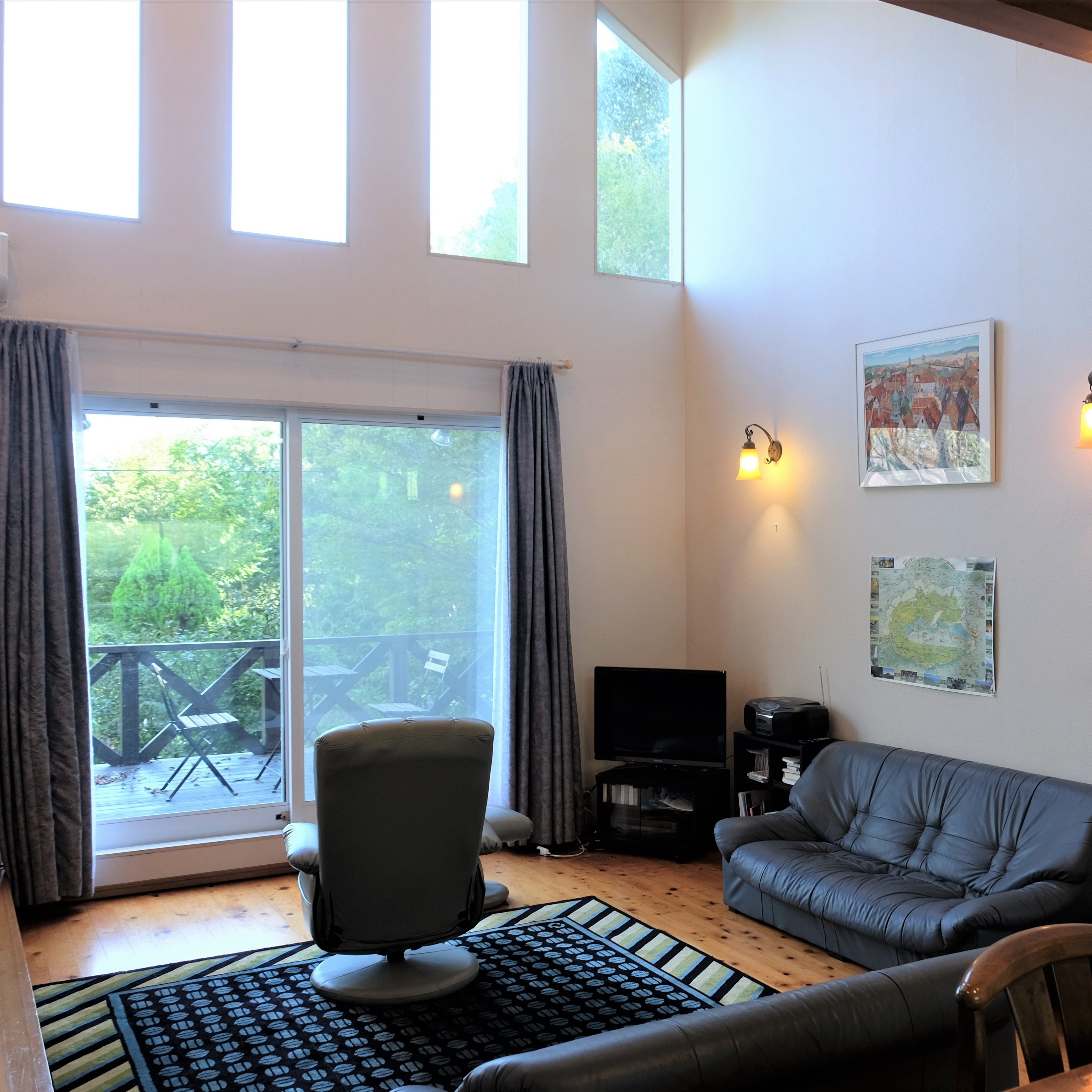 Living room. This window leads to the terrace.