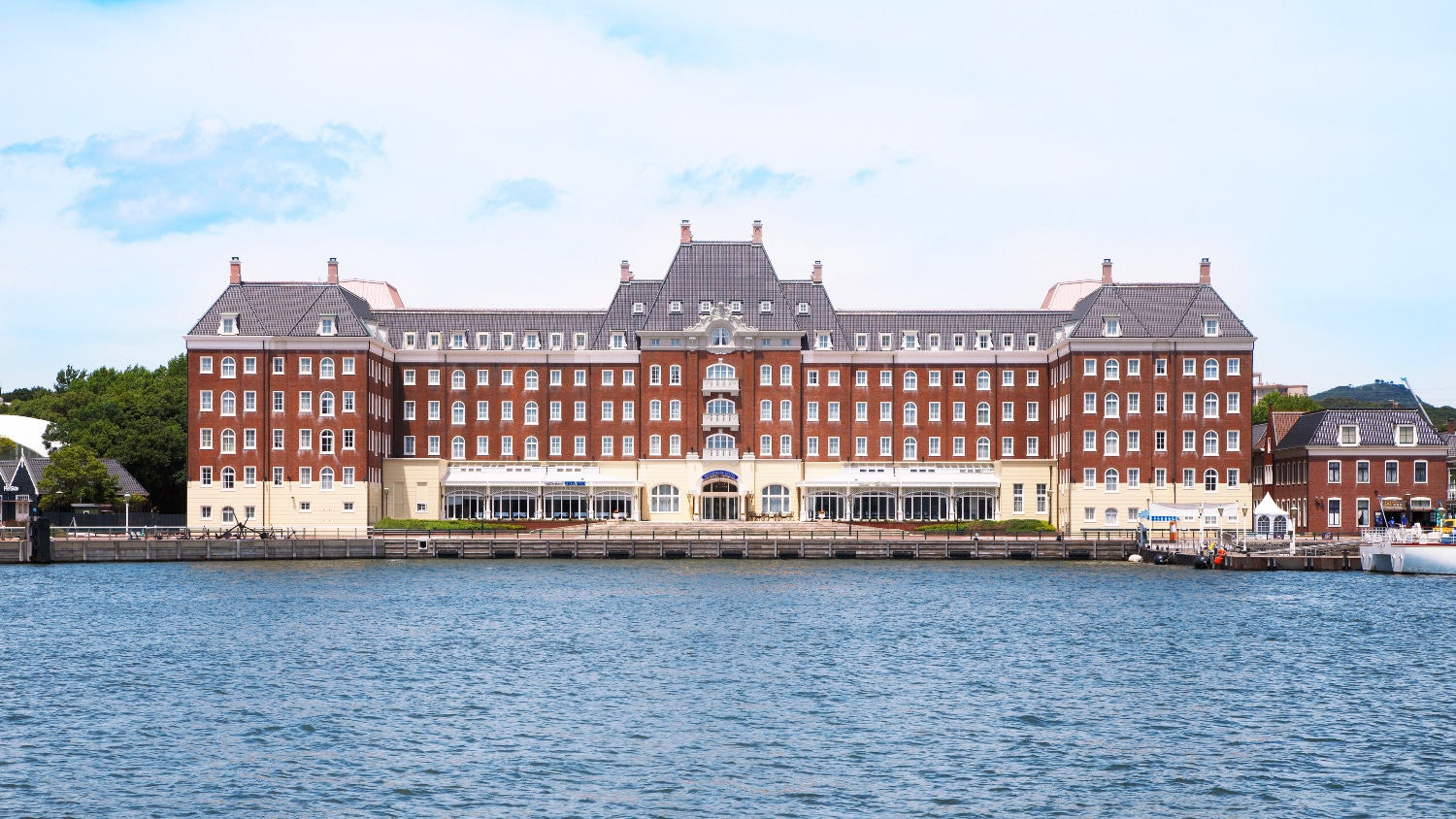 An oceanfront hotel with a calm sea and a soothing view