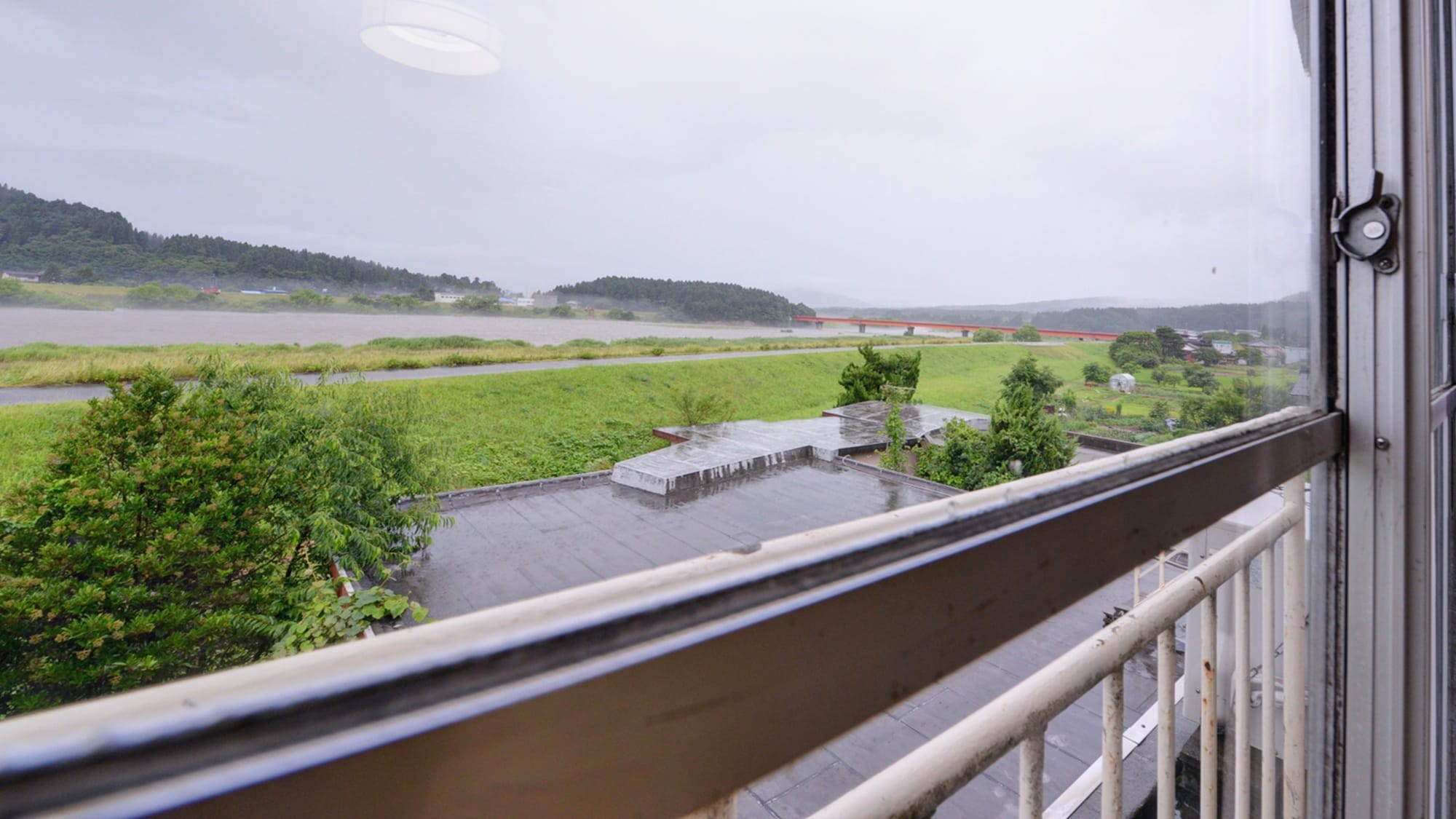 *View from the room: The tranquil Niigata countryside spreads out before you.