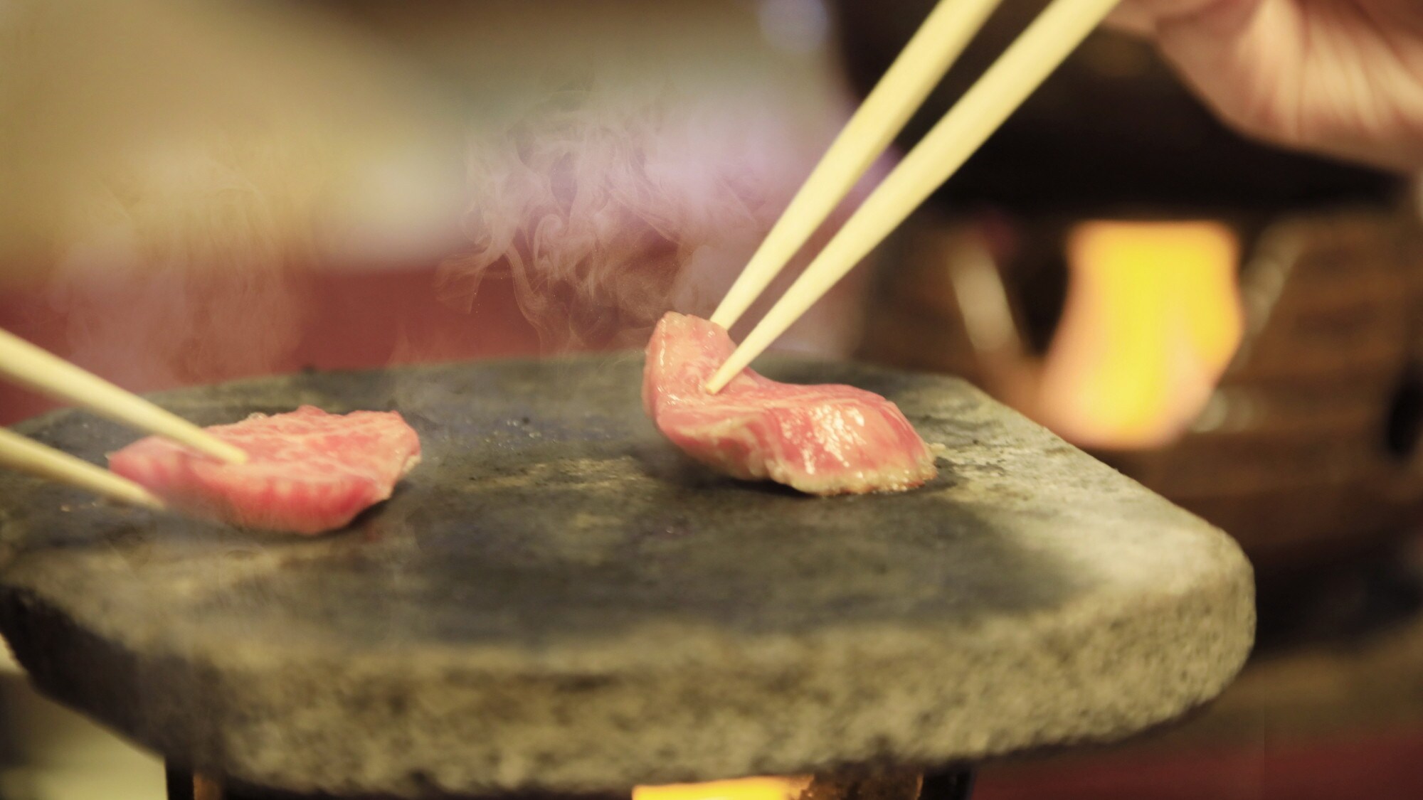 Koshu beef served on piping hot Fuji lava! *For illustrative purposes only