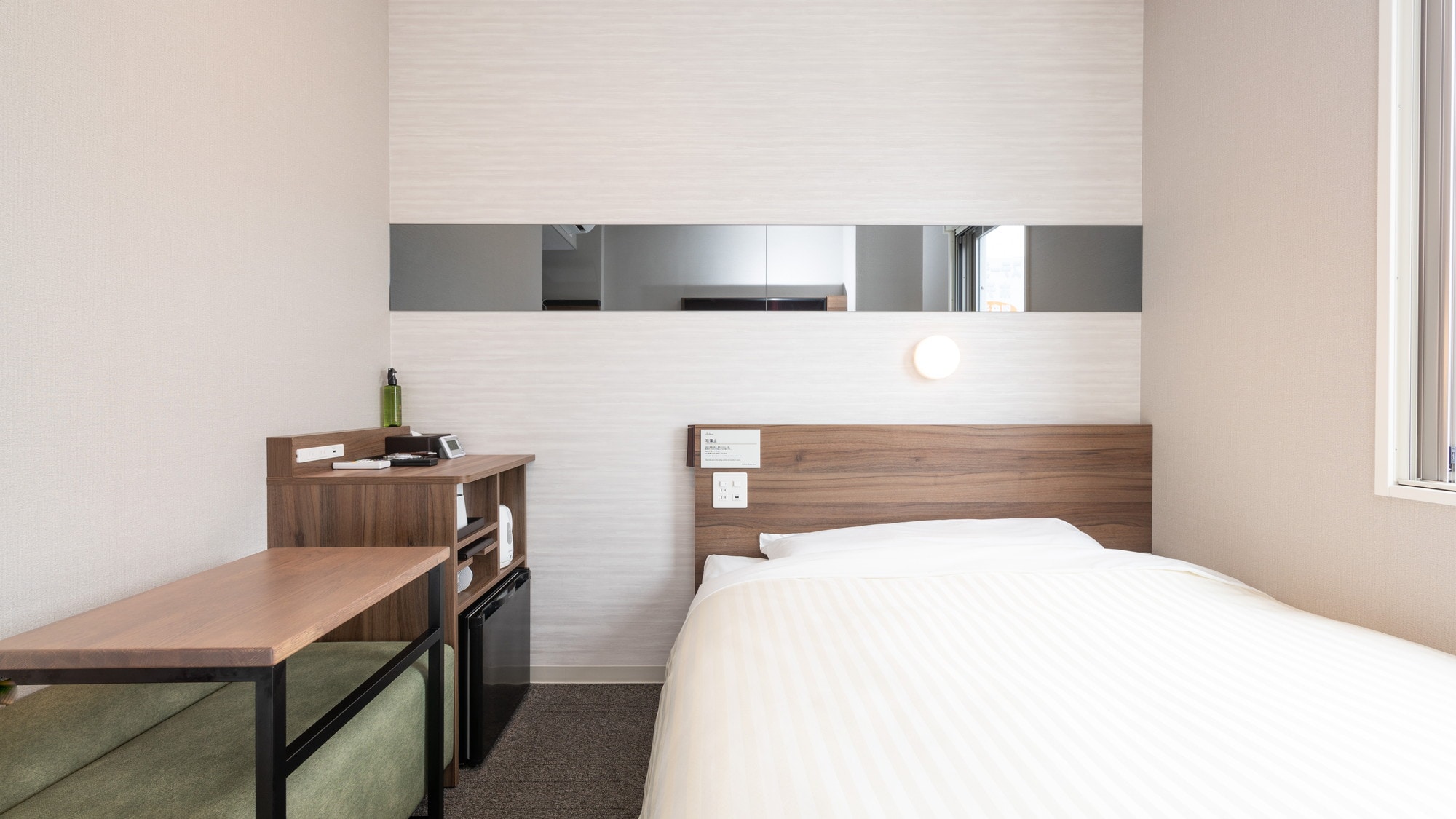 A wide bed designed for a good night's sleep and a mattress with just the right amount of firmness