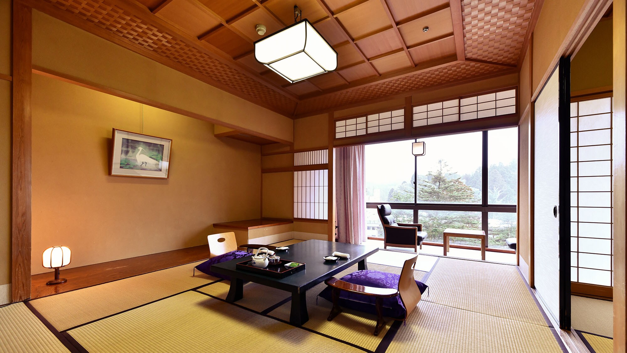 [Autumn House - Standard Japanese-Western Style Room] This room combines the gentle elegance of Japanese design with the comfort of a bed.
