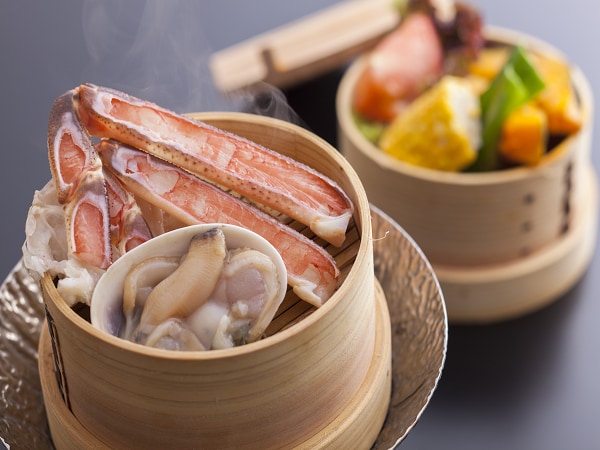 Steamed seafood in a bamboo steamer