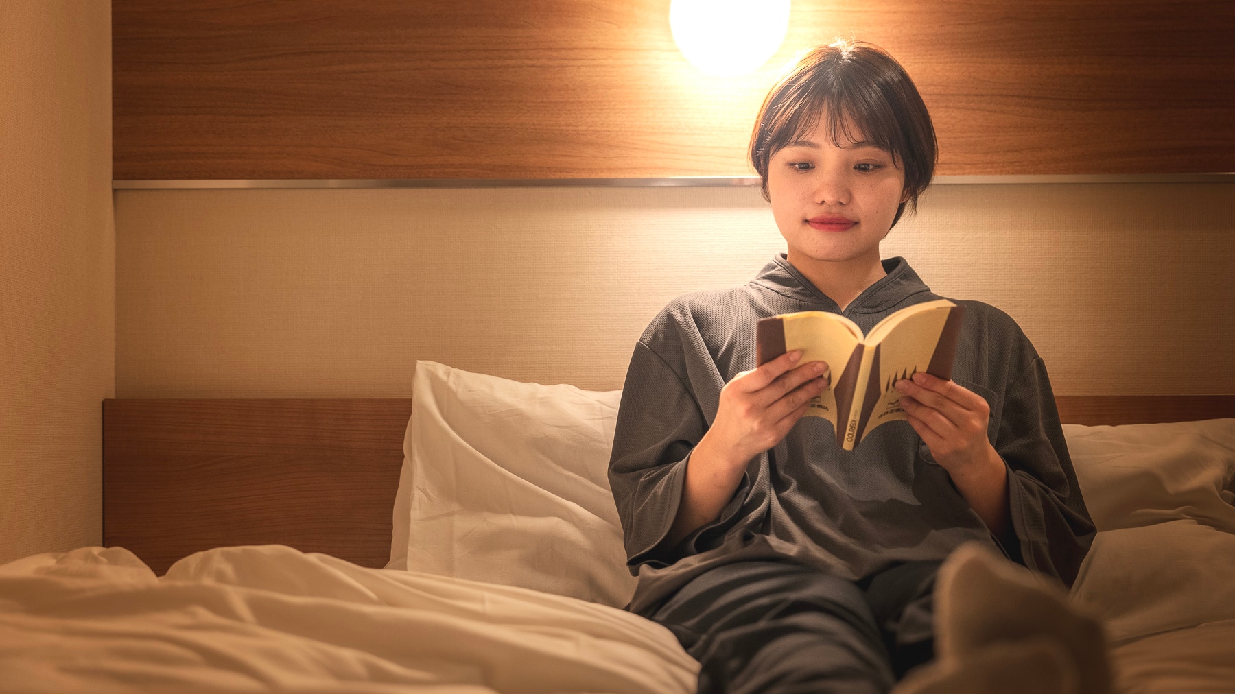 At night, the room is enveloped in soft light.
