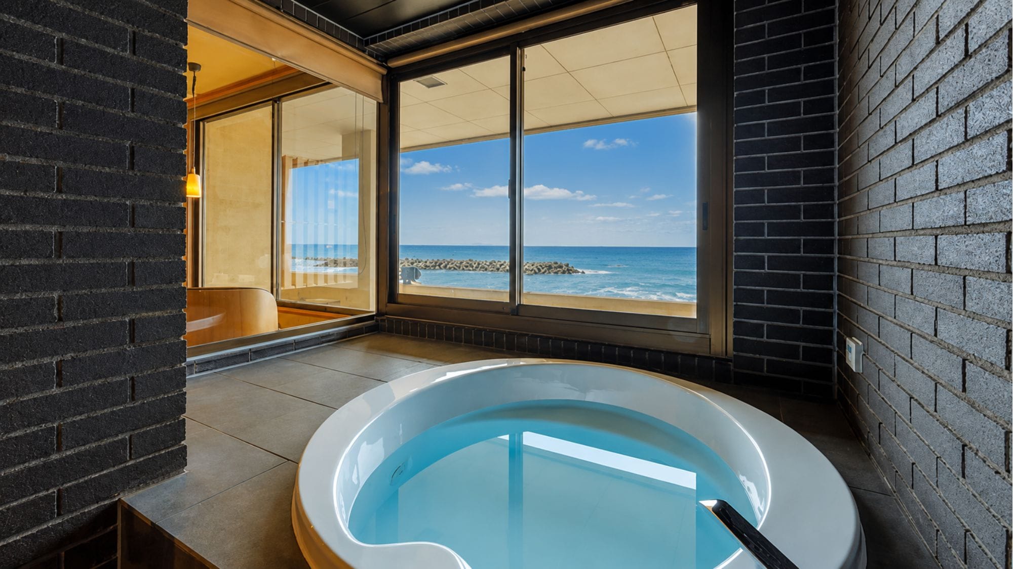 Renovated in November 2025. Enjoy a luxurious bath time in our panoramic jacuzzi with breathtaking views. (Example)