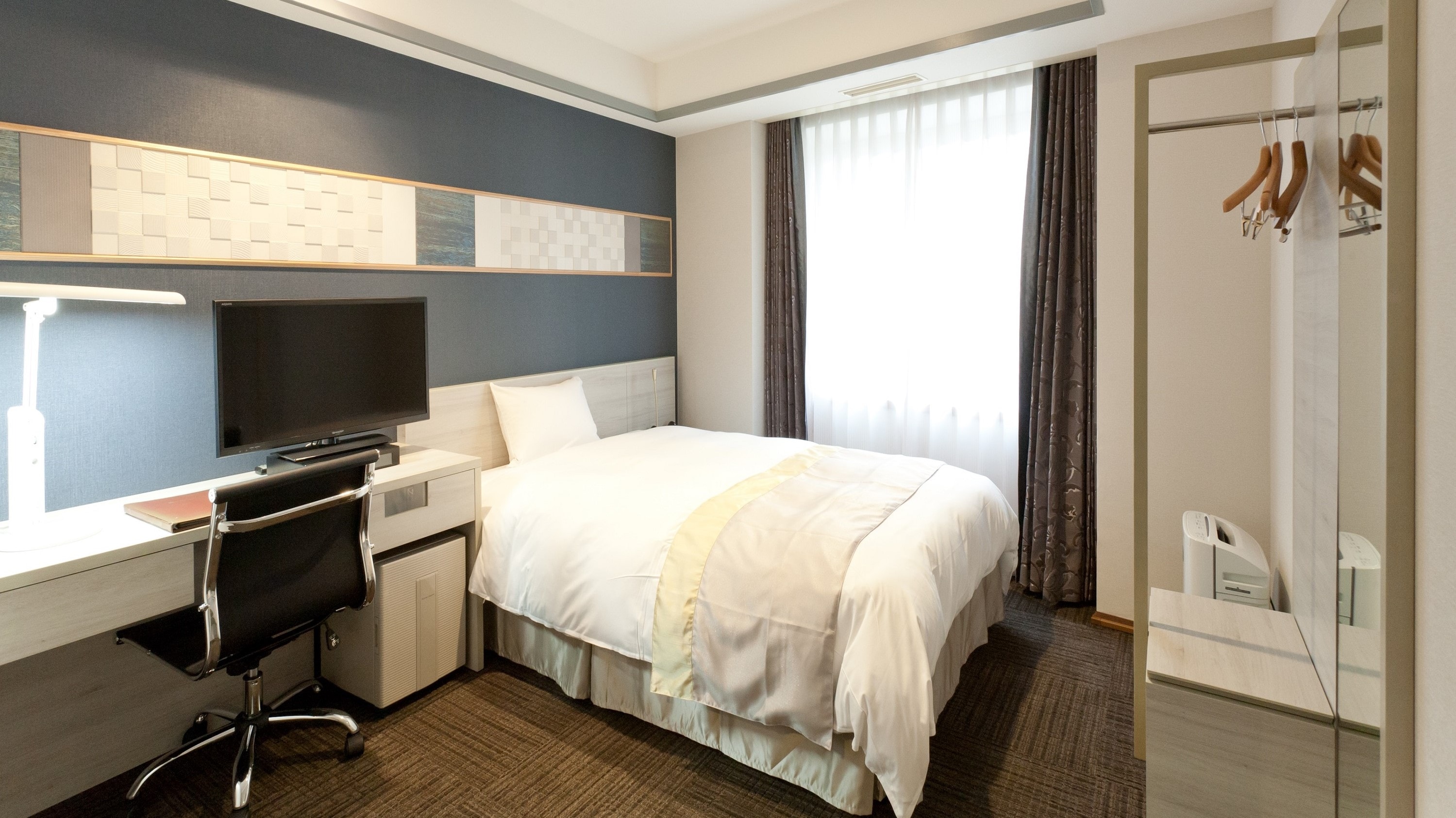 Contoh kamar deluxe single / semi-double bebas rokok Sekitar 16㎡ (Interior dan perabotan dapat bervariasi tergantung kamar