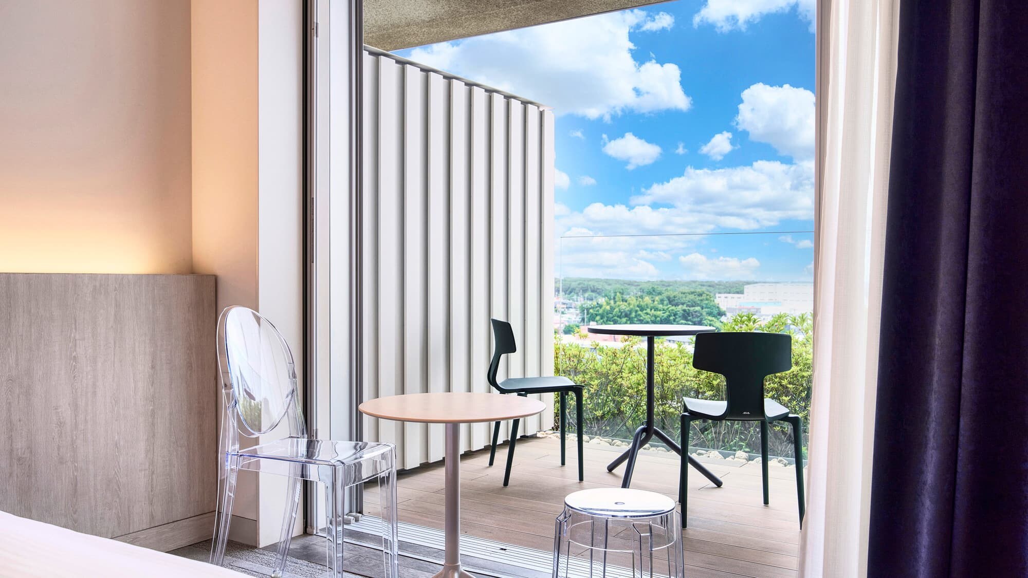 Deluxe Twin Room | Enjoy a relaxing time on our open terrace that connects you to the sky.