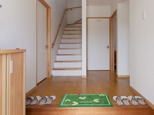 A spacious entrance hall. You take off your shoes before entering the building, so it's clean (Buildings A and B).
