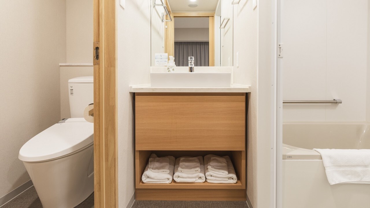 Superior twin bathroom, sink, toilet