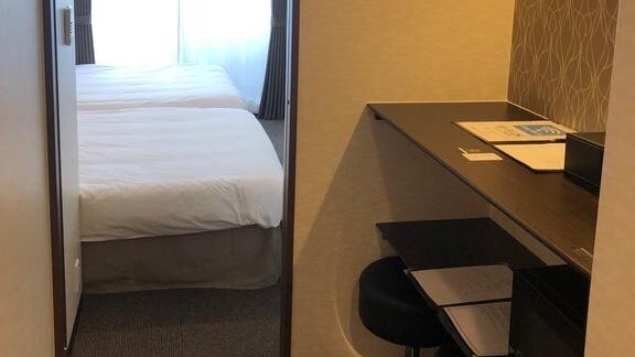 The rooms are clean and have heavy furniture, giving them a slightly chic impression.