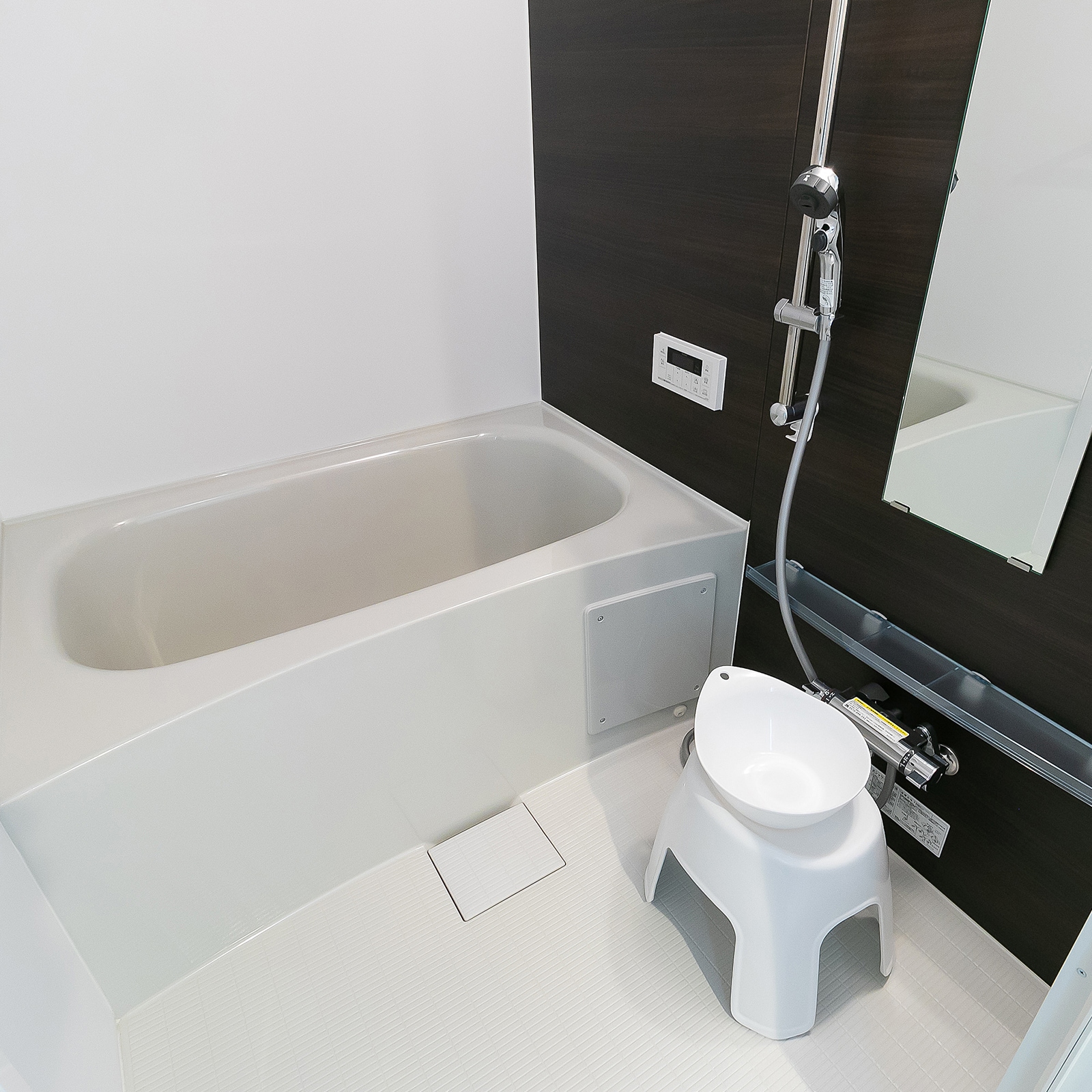 The bathroom is separate from the toilet.