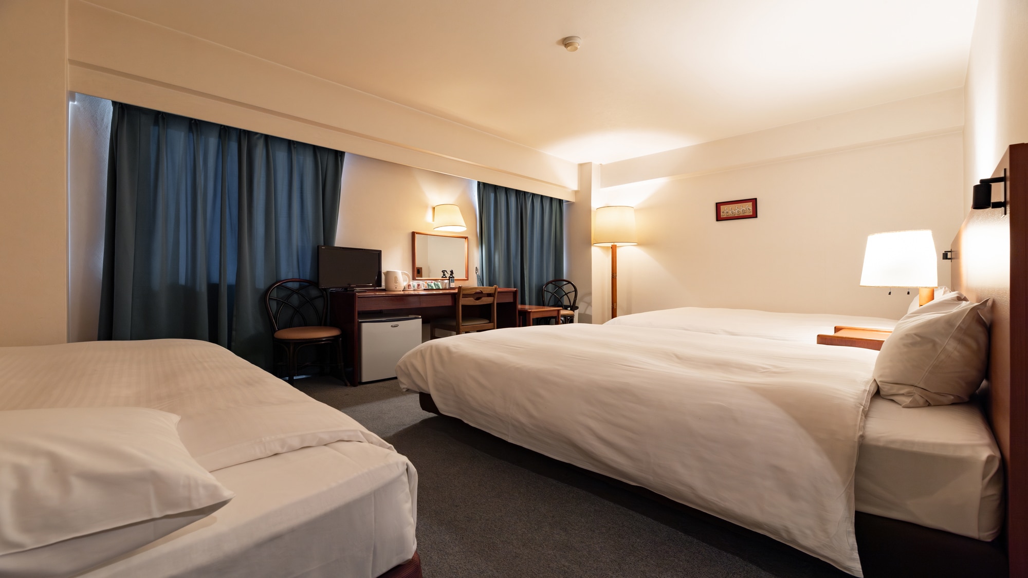 Triple room (2 semi-double beds, 1 extra bed)