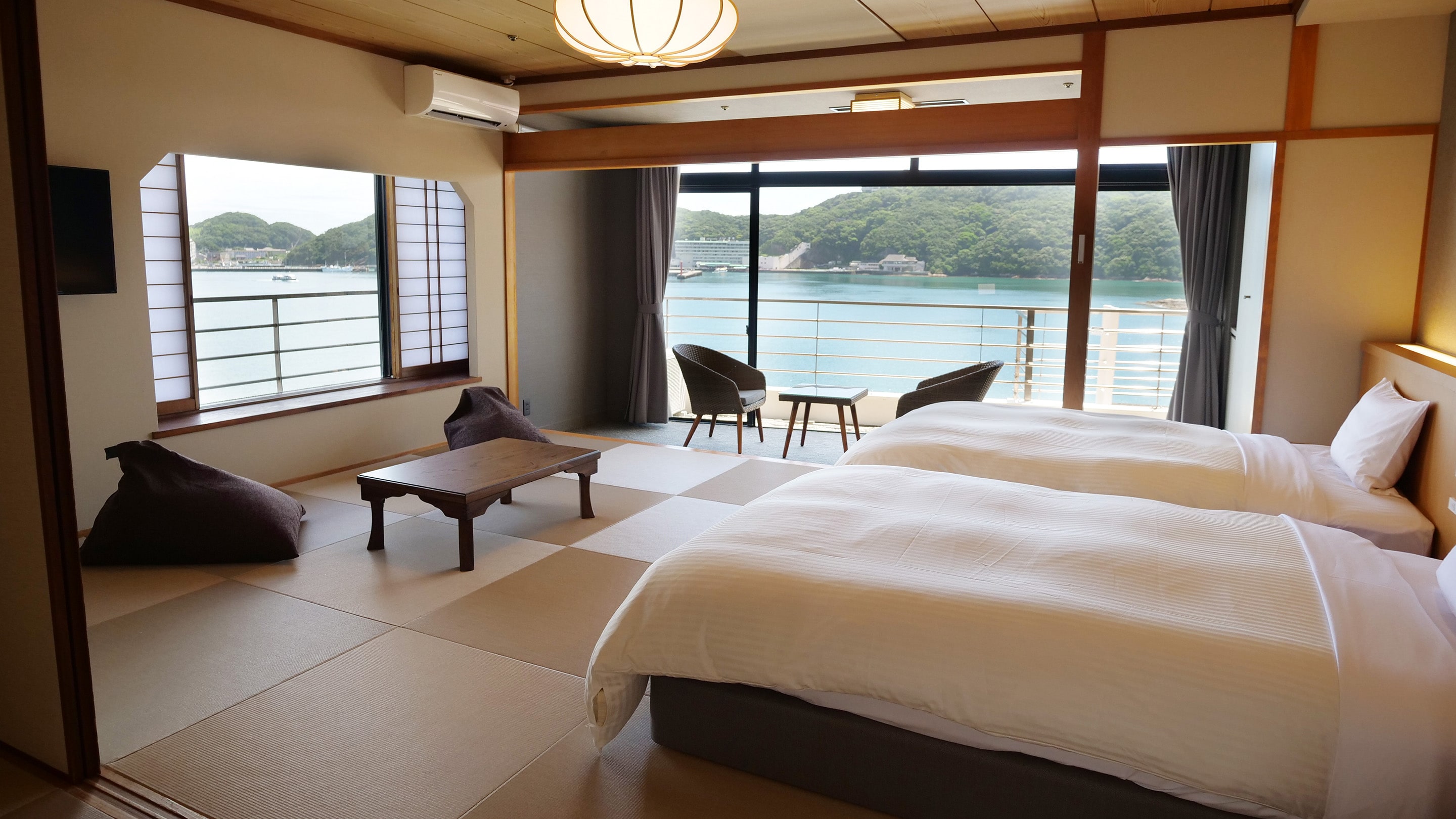 Standard Japanese-style twin room with indoor bath *Example of guest room