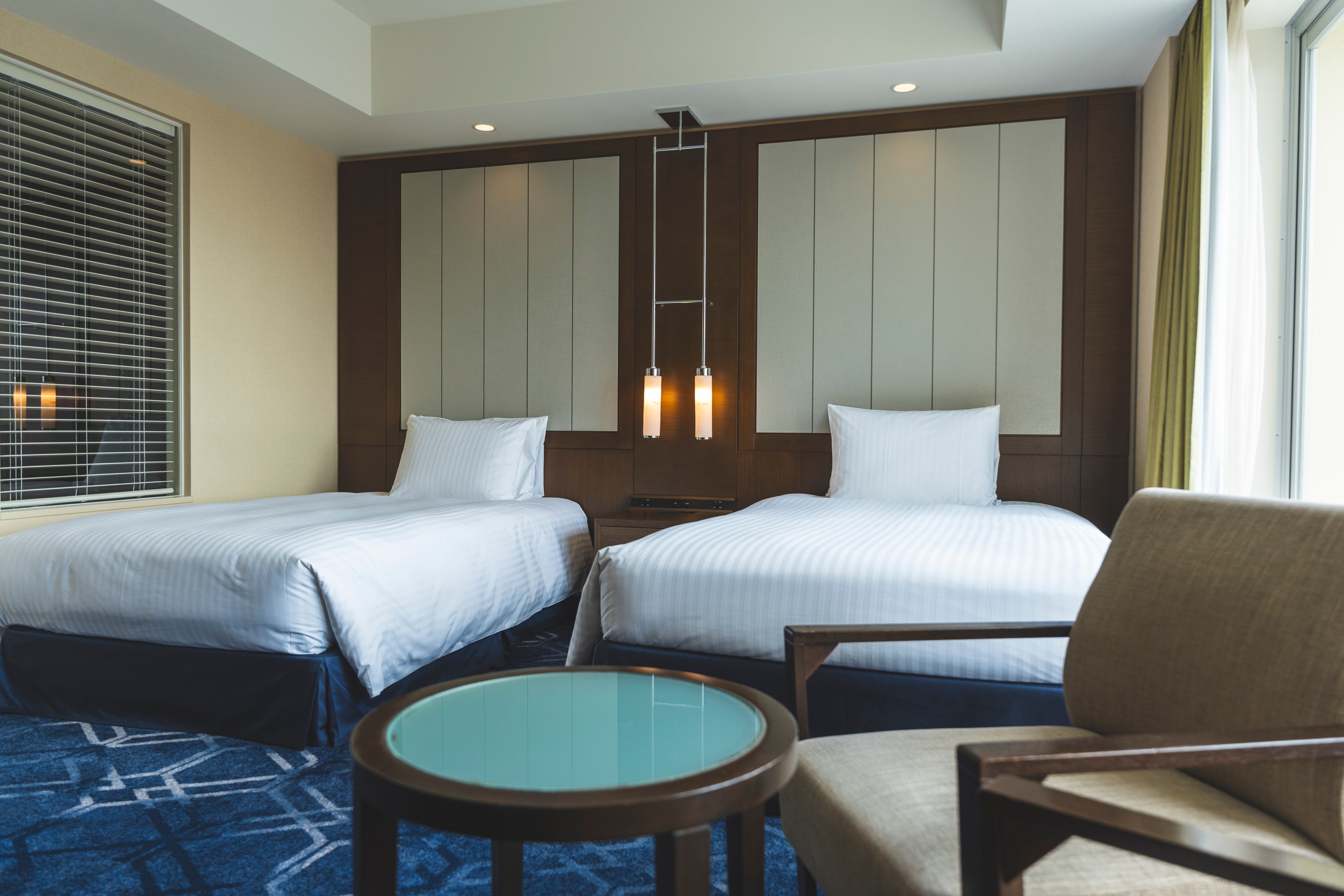 Example of a renovated city view twin room