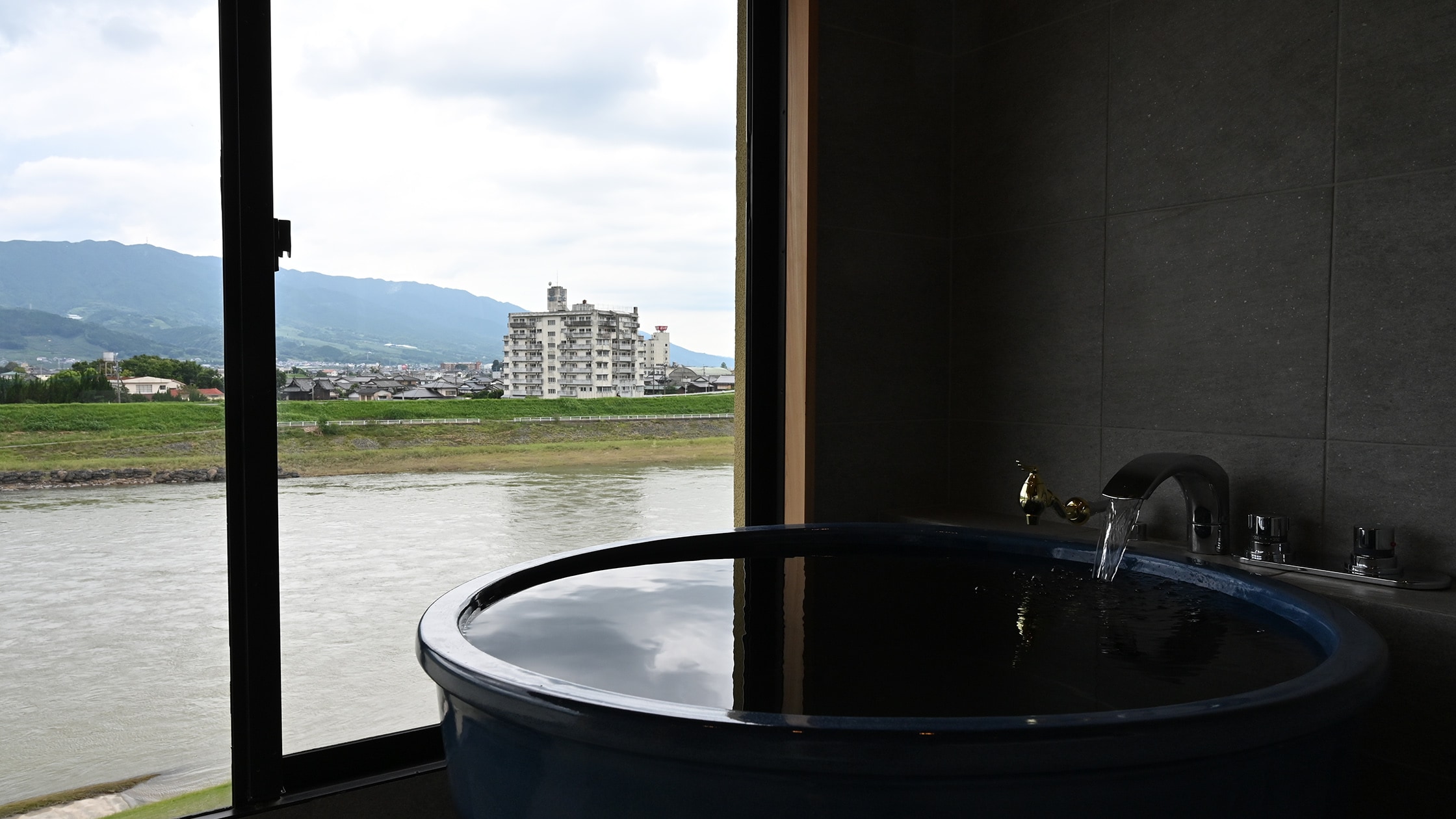 An example of a guest room bath (River view hot spring suite)