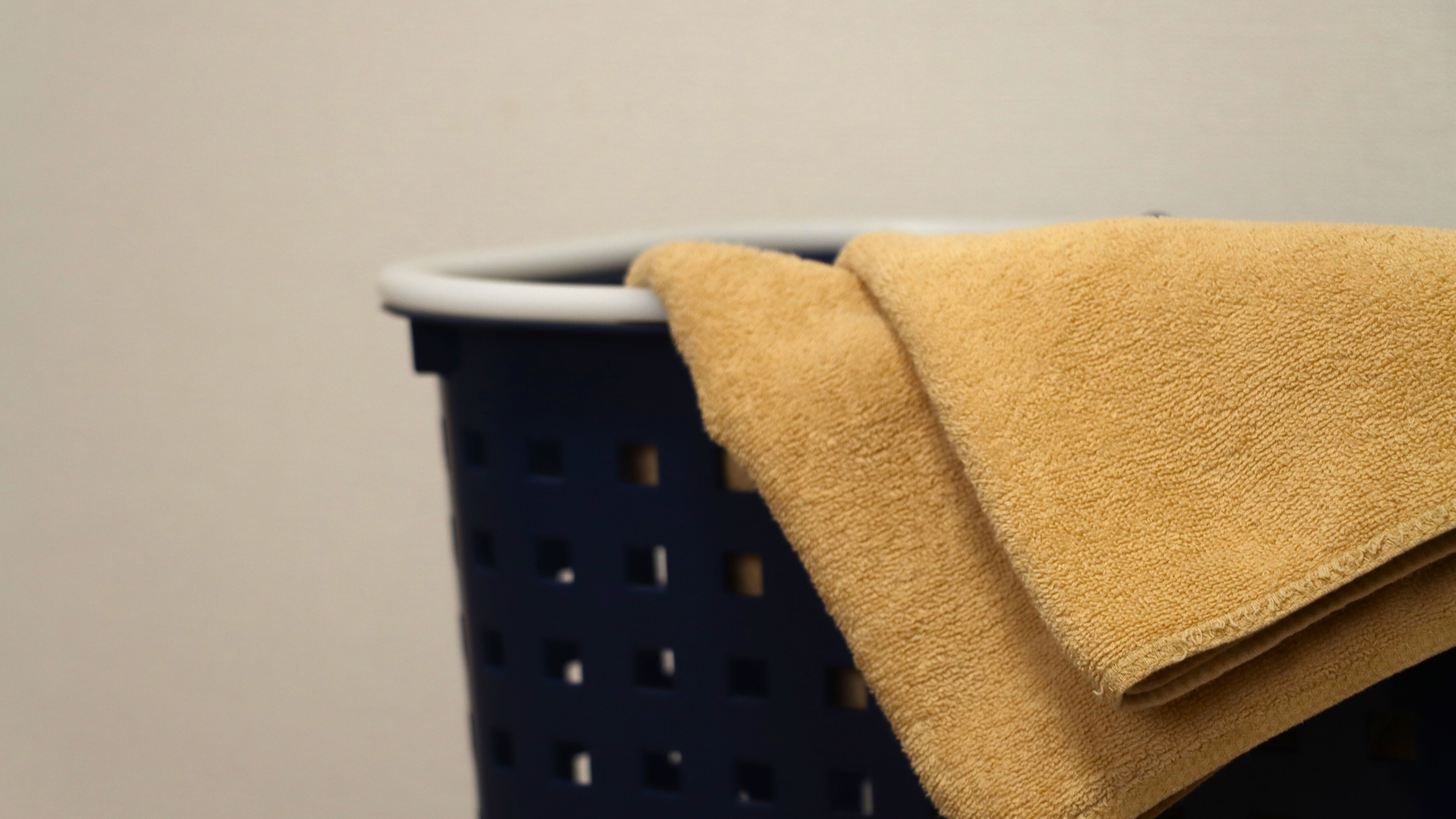 Each room is equipped with face towels and laundry baskets.