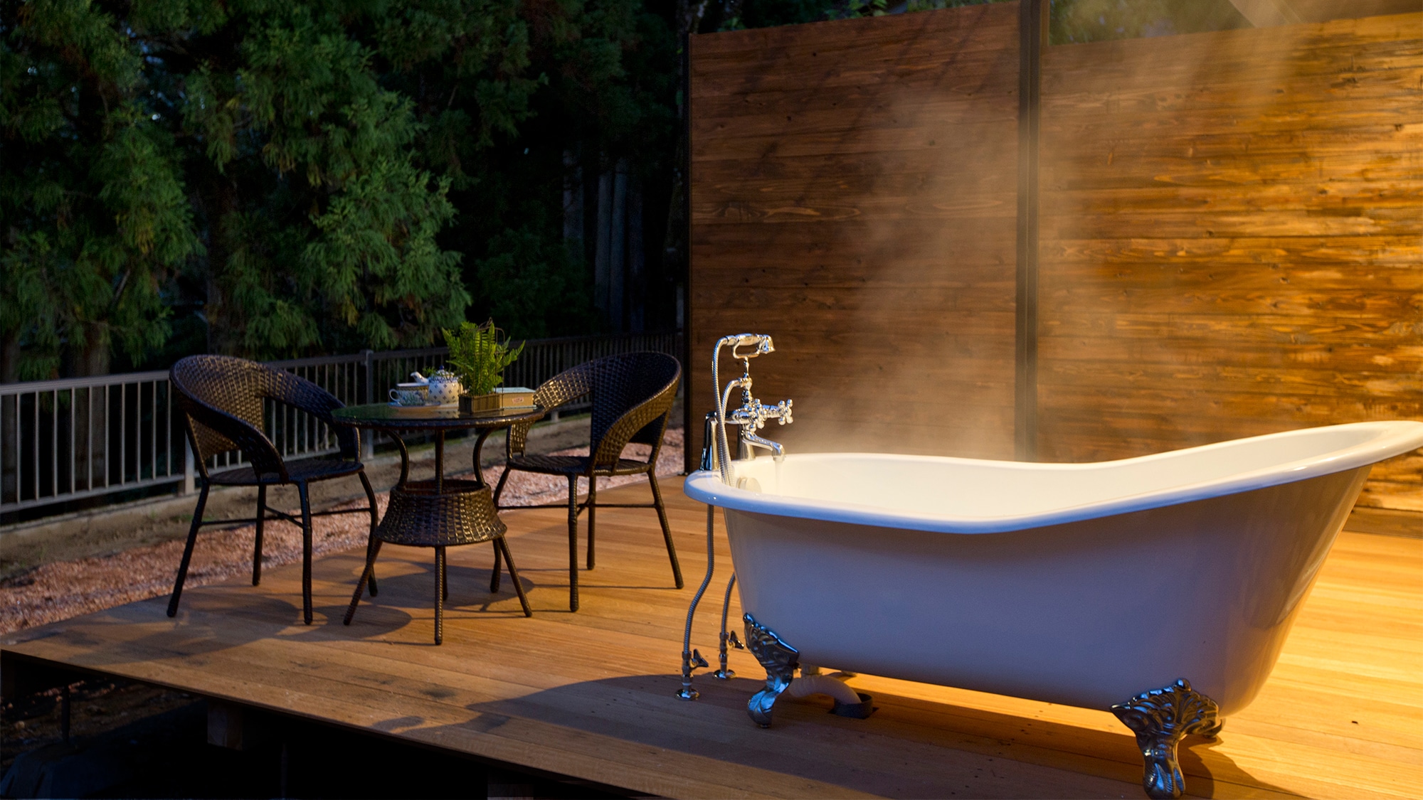 Open-air bath with clawfoot bathtub on the first floor