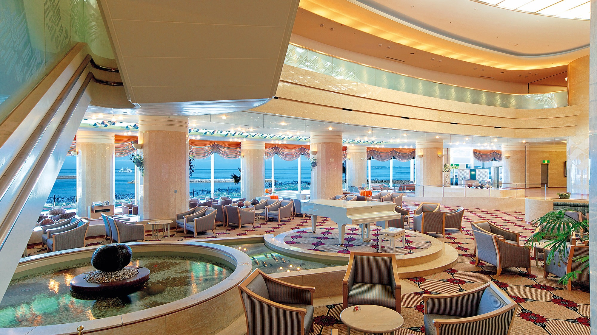 <Open-ceiling lobby lounge>
