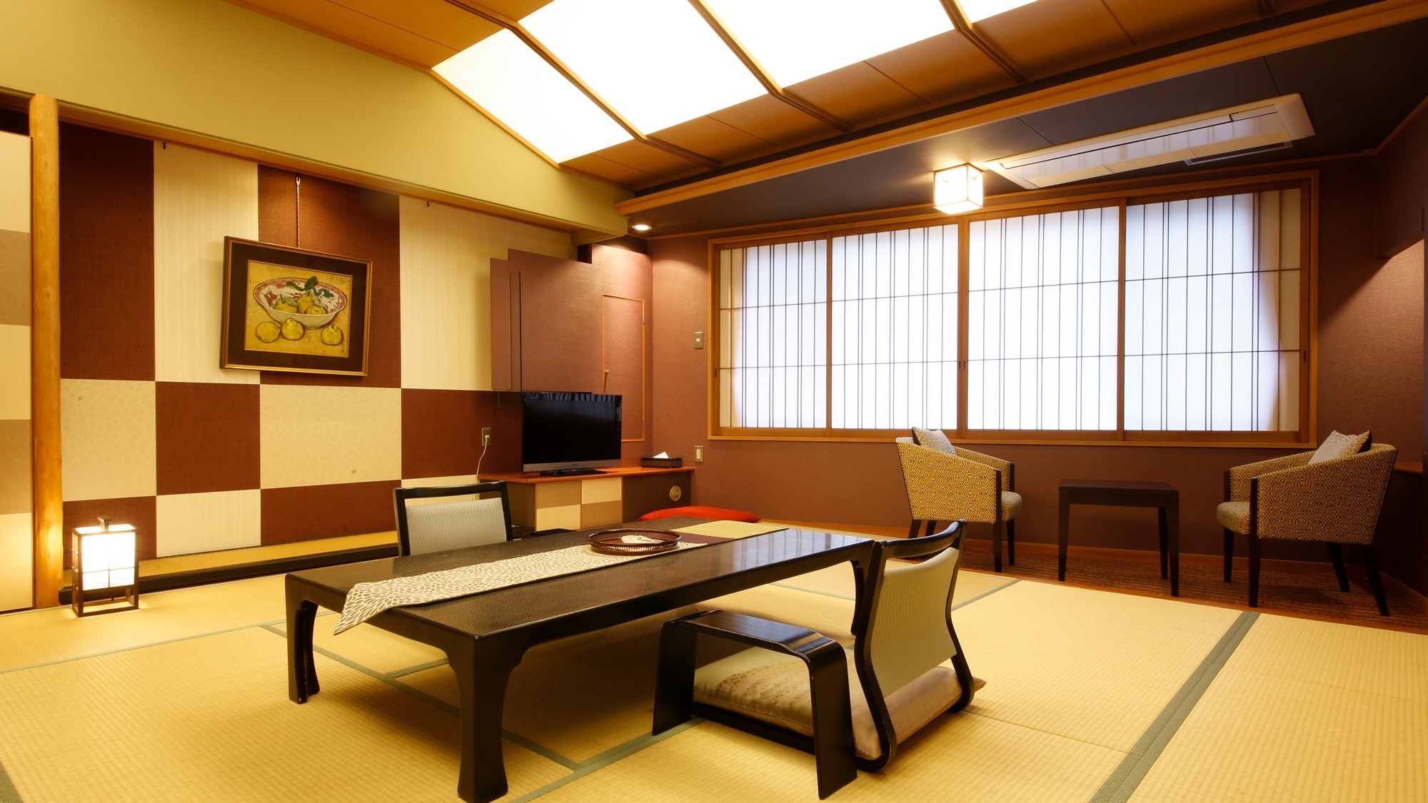 優雅的日式現代豪華客房 <Checkered-ICHIMATSU> 統一的格子圖案和沈穩的紅色。