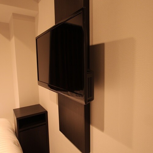 TV ｜ Wall-mounted TV. You can enjoy it while relaxing in bed.