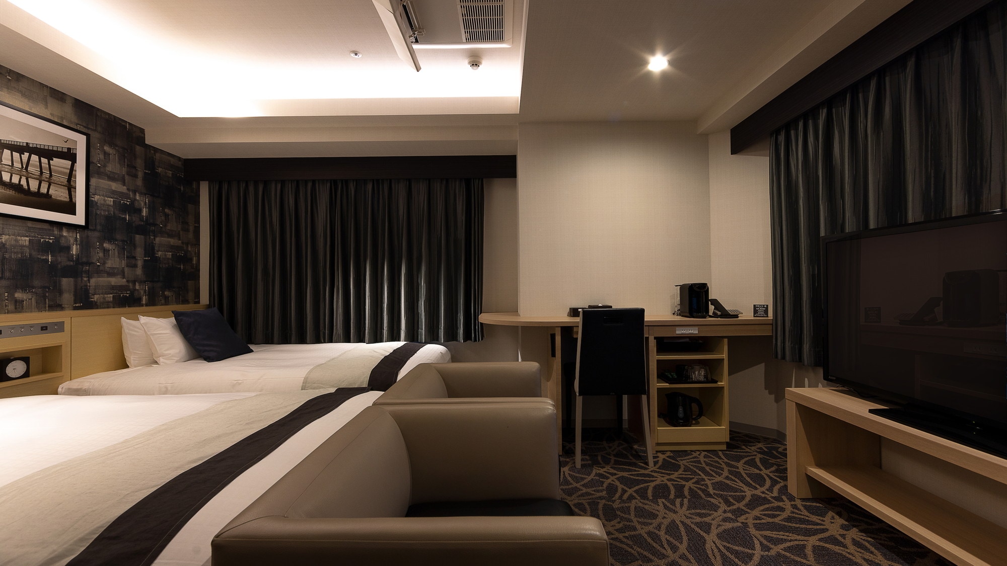 豪华双床房 *每位成人最多可让 1 名儿童使用同一张床。