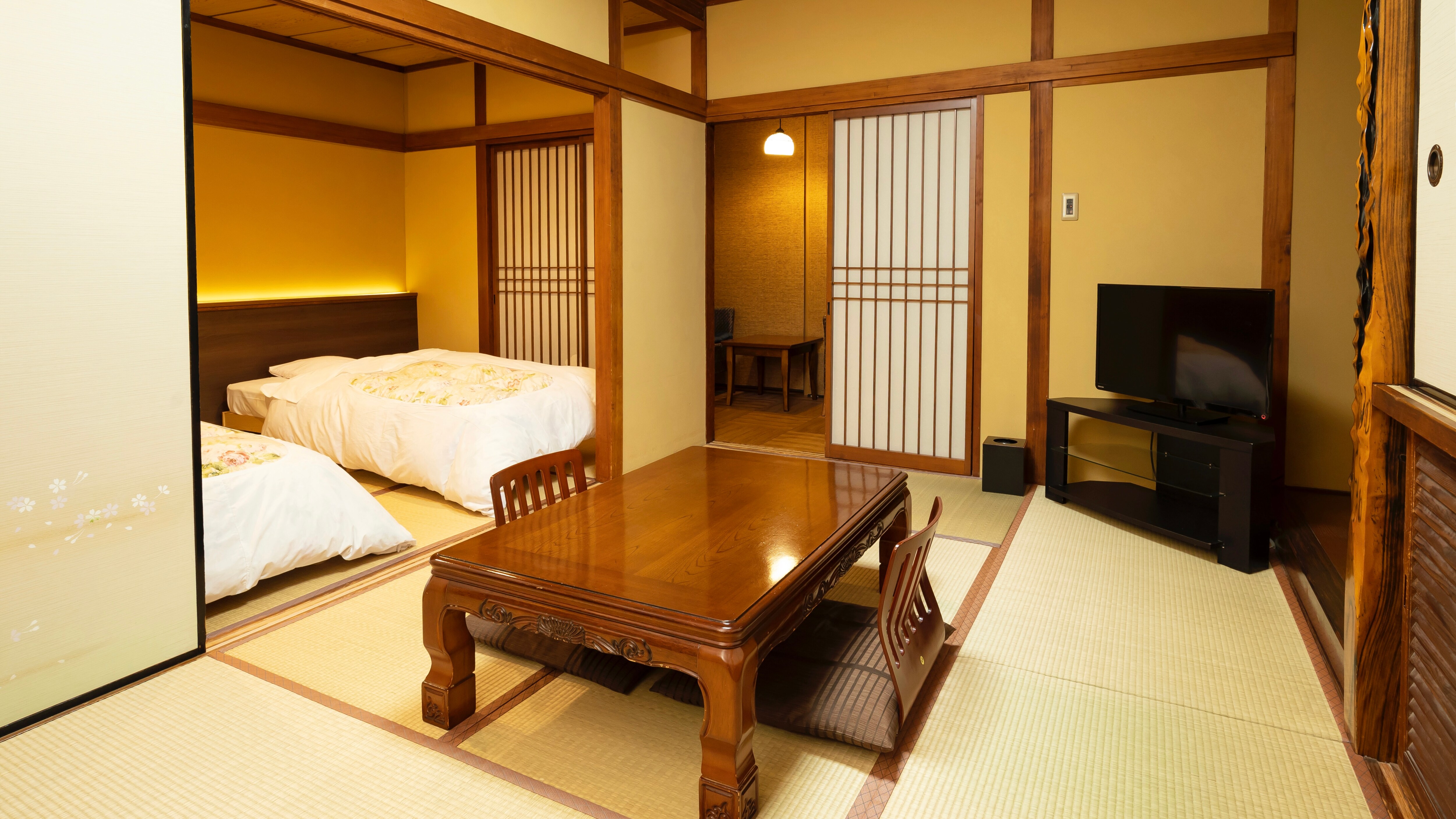 A Japanese-style room with a total of 14 tatami mats, consisting of an 8 tatami mat living room and a 6 tatami mat bedroom. It has a wide veranda. It is popular with families with children and those who want a slightly larger room.