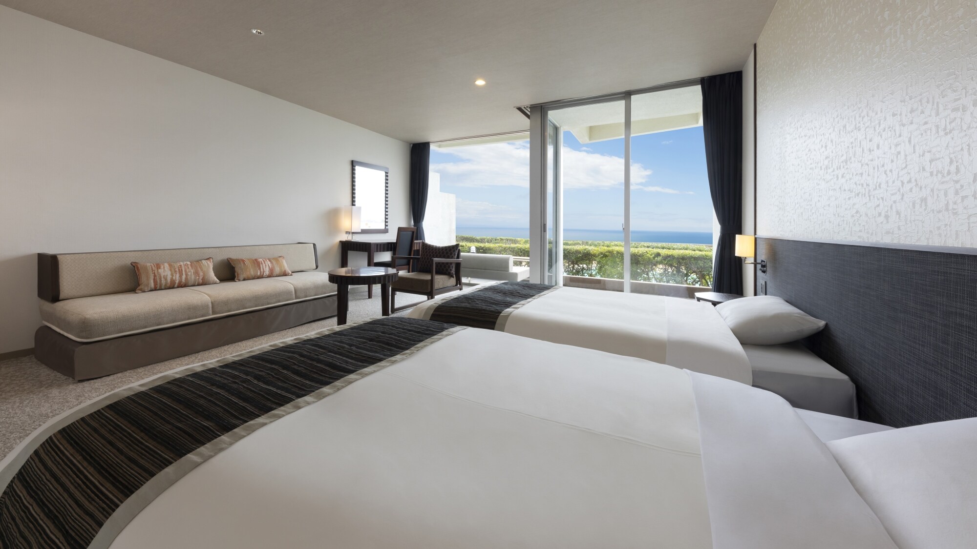 [Renewed in March 2024] Oceanfront and poolside rooms. The terrace is equipped with chairs and tables.